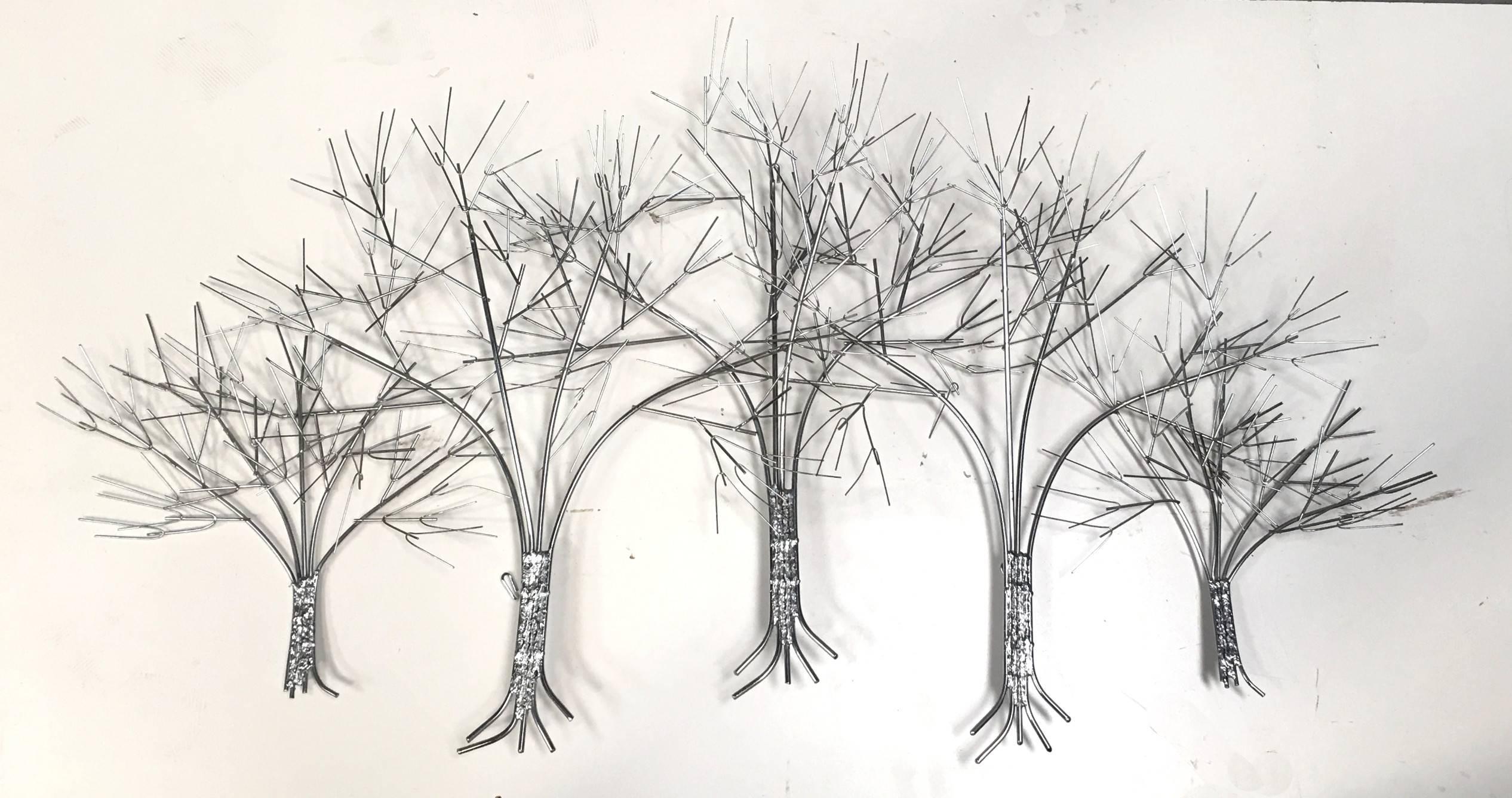 Large-scale wall sculpture depicting trees in winter by C. Jere. This larger than usual, signed piece is beautifully rendered and in excellent original condition.