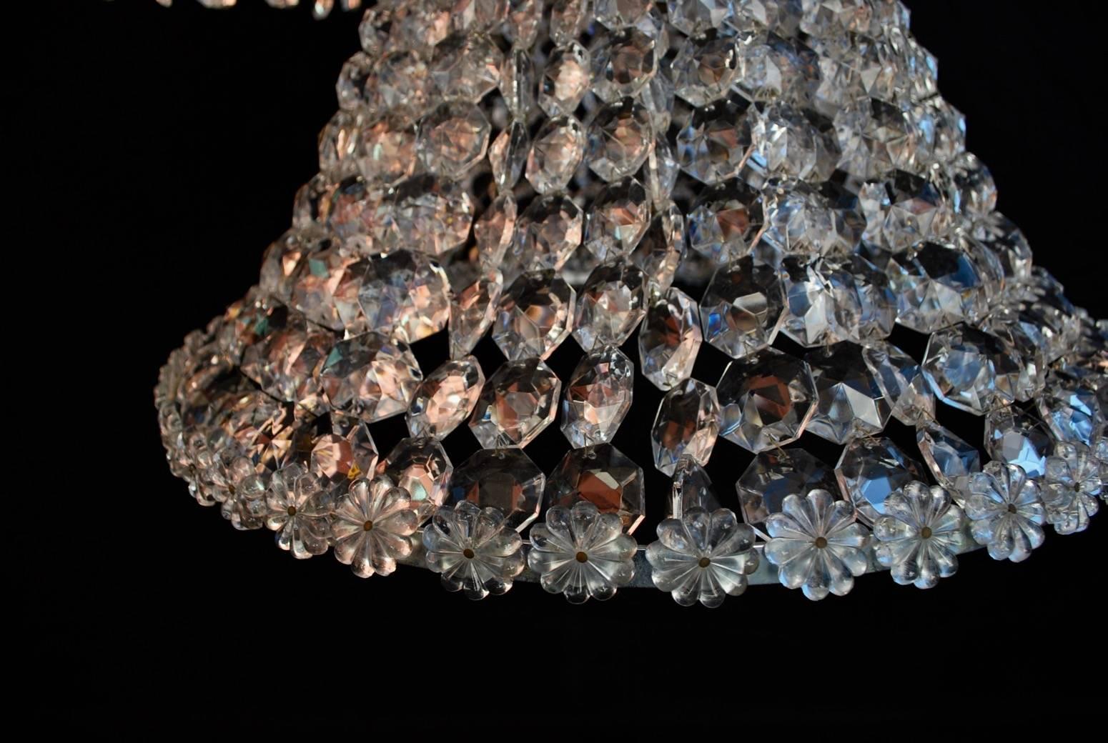 What a beautiful pair of crystal chandeliers, they have both world into them, classic mix with modern.

 