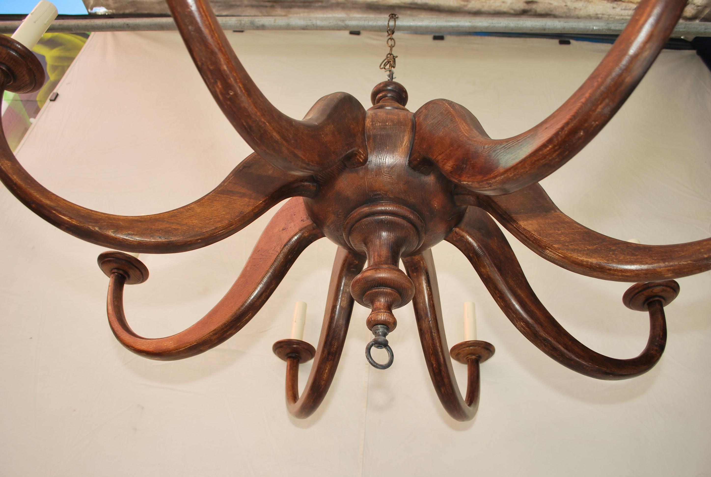 Late 20th Century beautiful and sexy  large wood chandelier For Sale