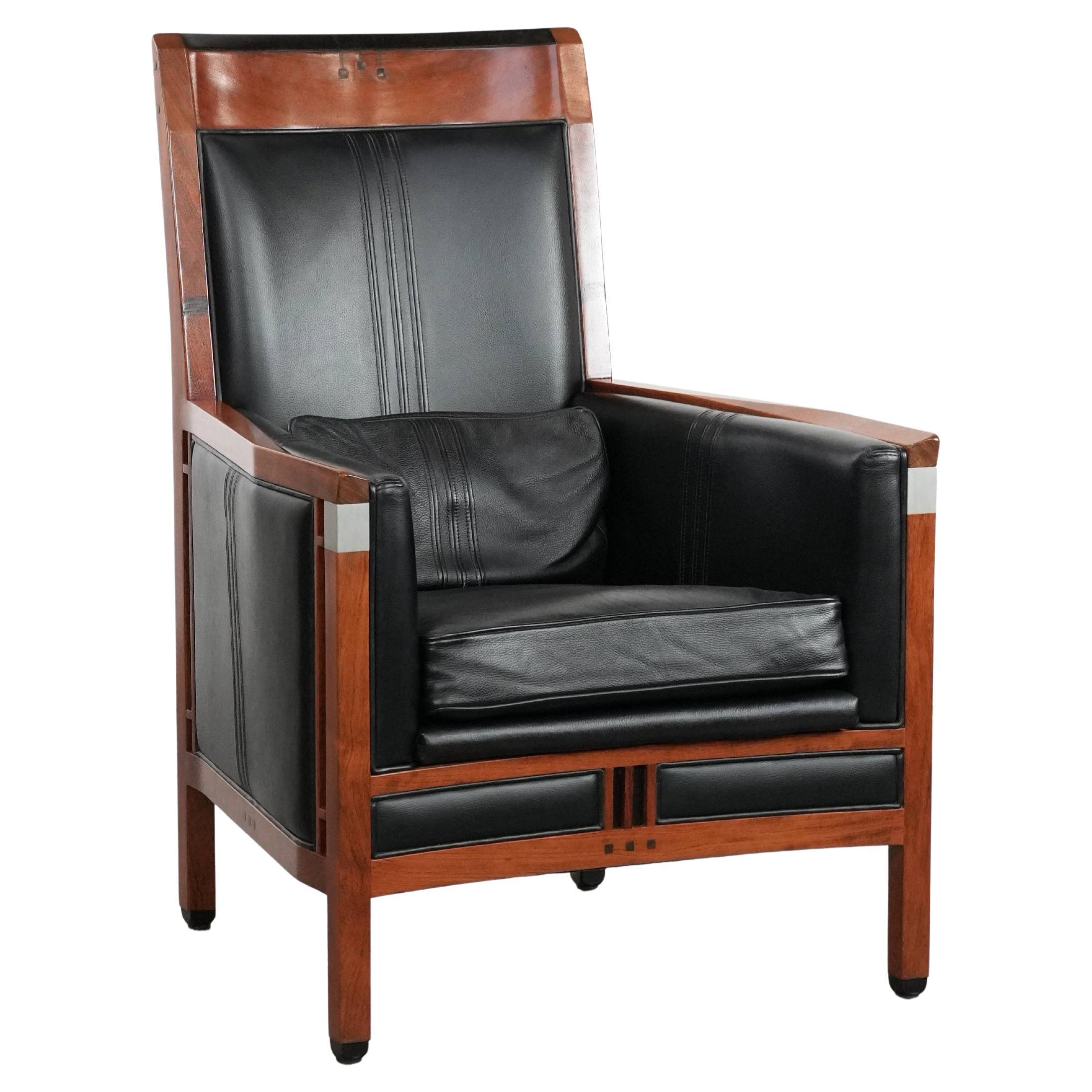 Beautiful and very comfortable black Art Deco design armchair