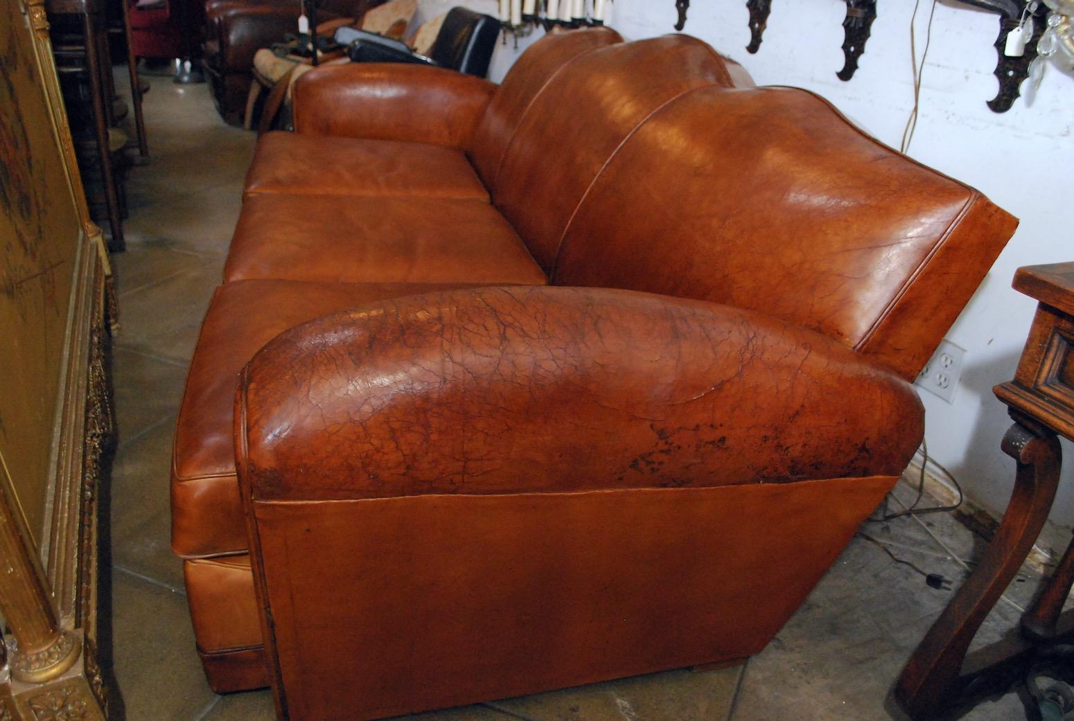 A Beautiful and very rare Leather club sofa, the last time I saw one of this beauty was 17 years ago,
If i did not have a crazy three years old son, I would keep it for me, I spent more then two hours trying to get the true color and beauty of this