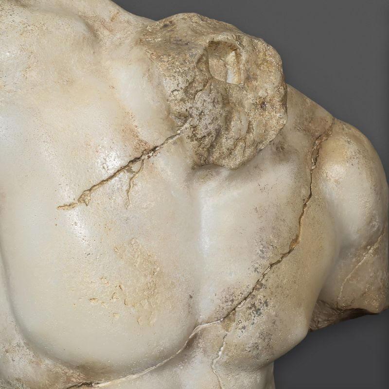 Beautiful antique bust of a warrior in the Roman style, 20th century.

Antique-style nude male, bust in composite material, 20th century.    
h: 82cm , w: 72cm, d: 46,5cm