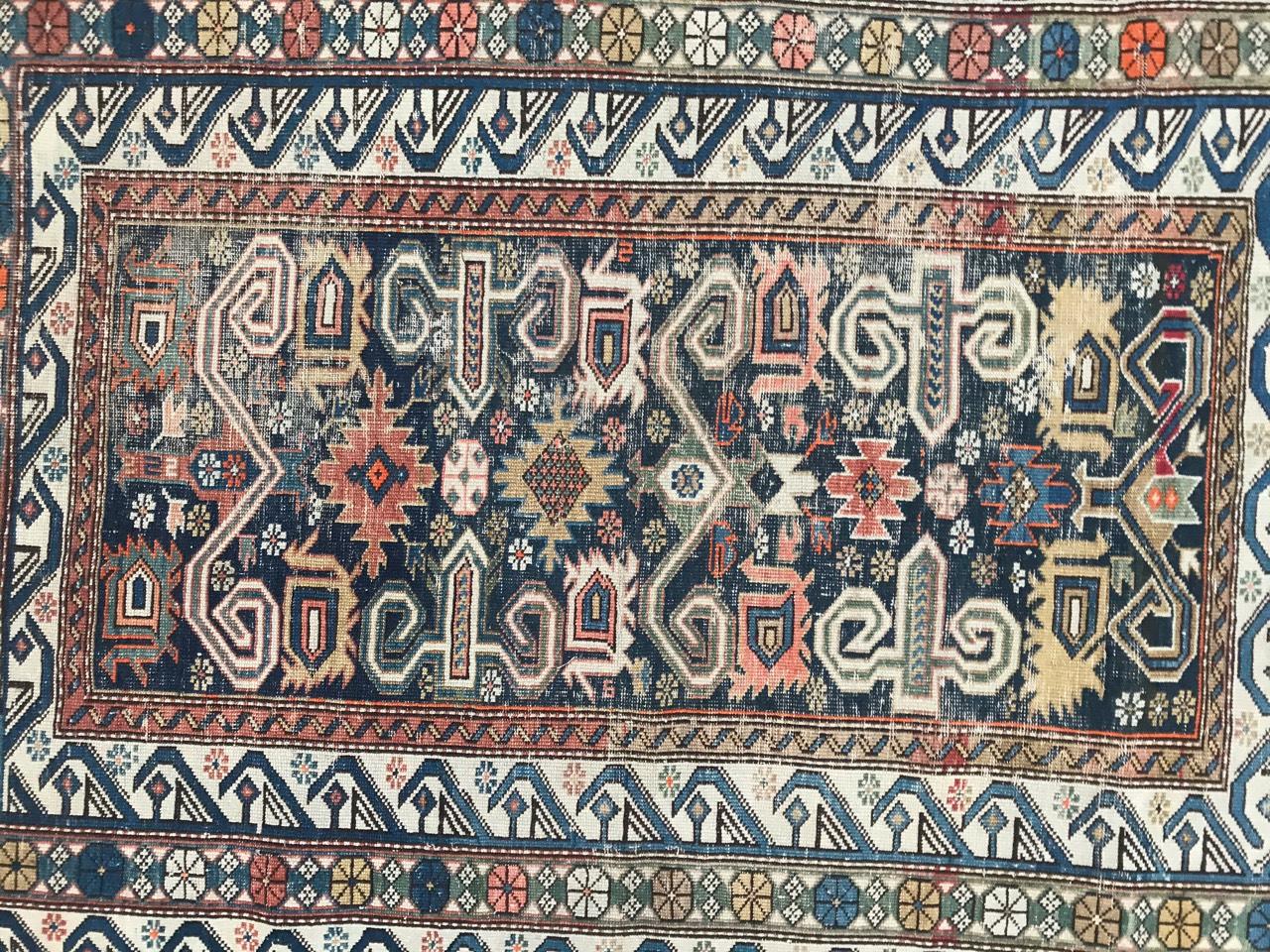 Nice late 19th century Shirvan rug with a Perepedil design and natural colors with green, blue and orange, entirely hand knotted with wool velvet on wool foundation.