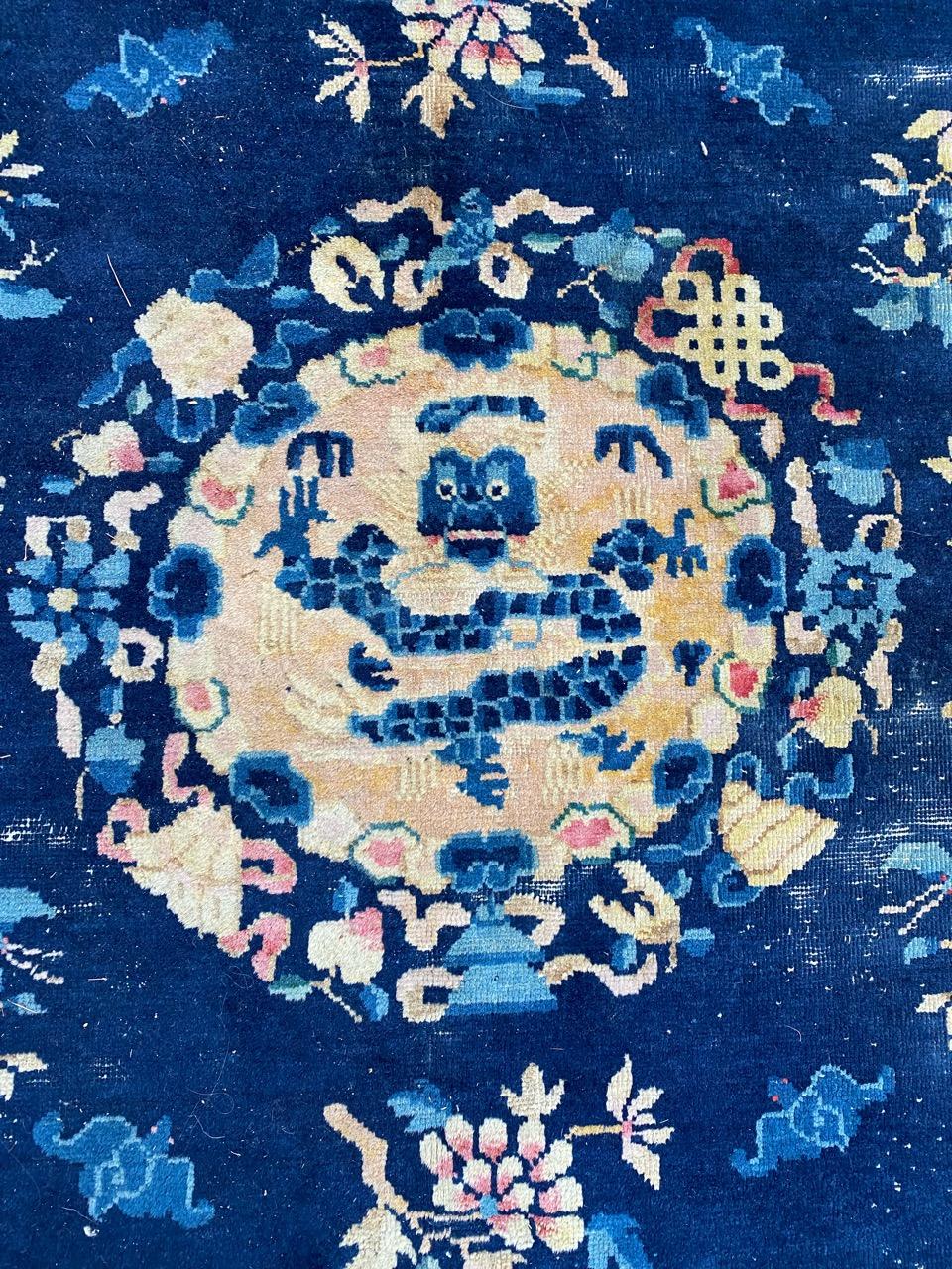 Very beautiful late 19th century Chinese beijing rug with beautiful Chinese design with dragon, birds and flowers, and nice natural colors, entirely hand knotted with wool velvet on cotton foundation.