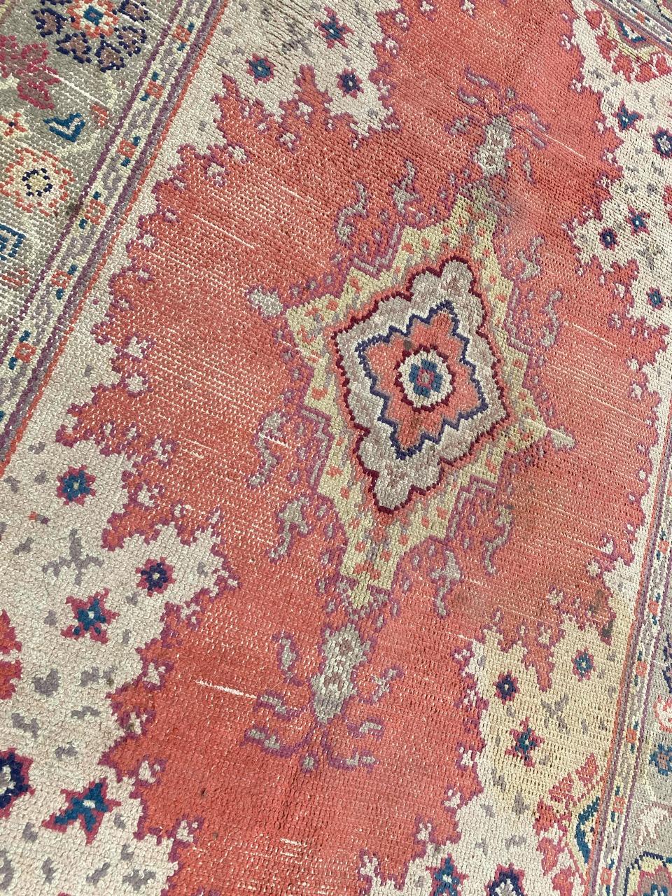 Nice European rug with a central medallion design and beautiful colors, entirely hand knotted with wool velvet on cotton foundation.