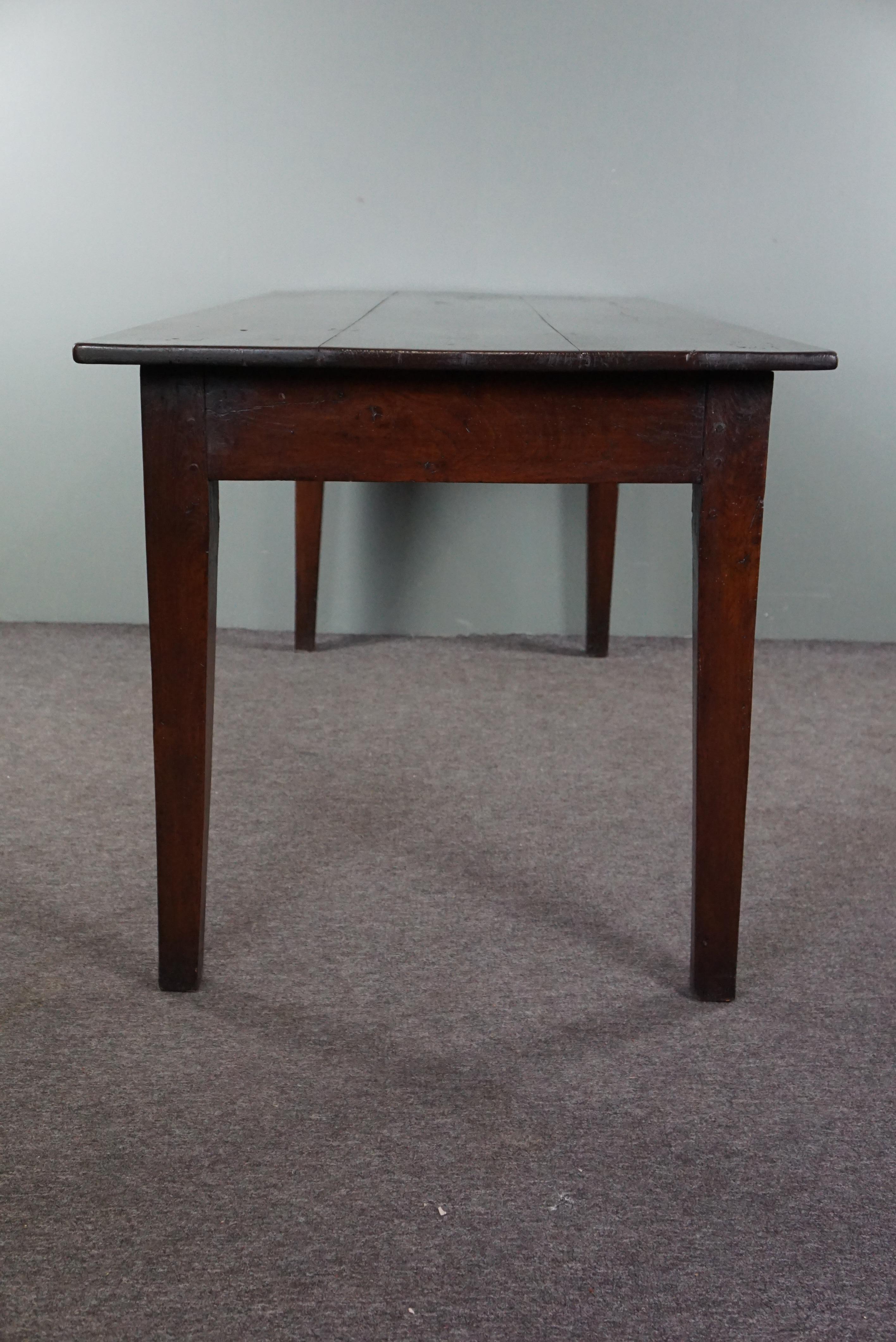 Fruitwood Beautiful antique French dining table with two drawers. For Sale