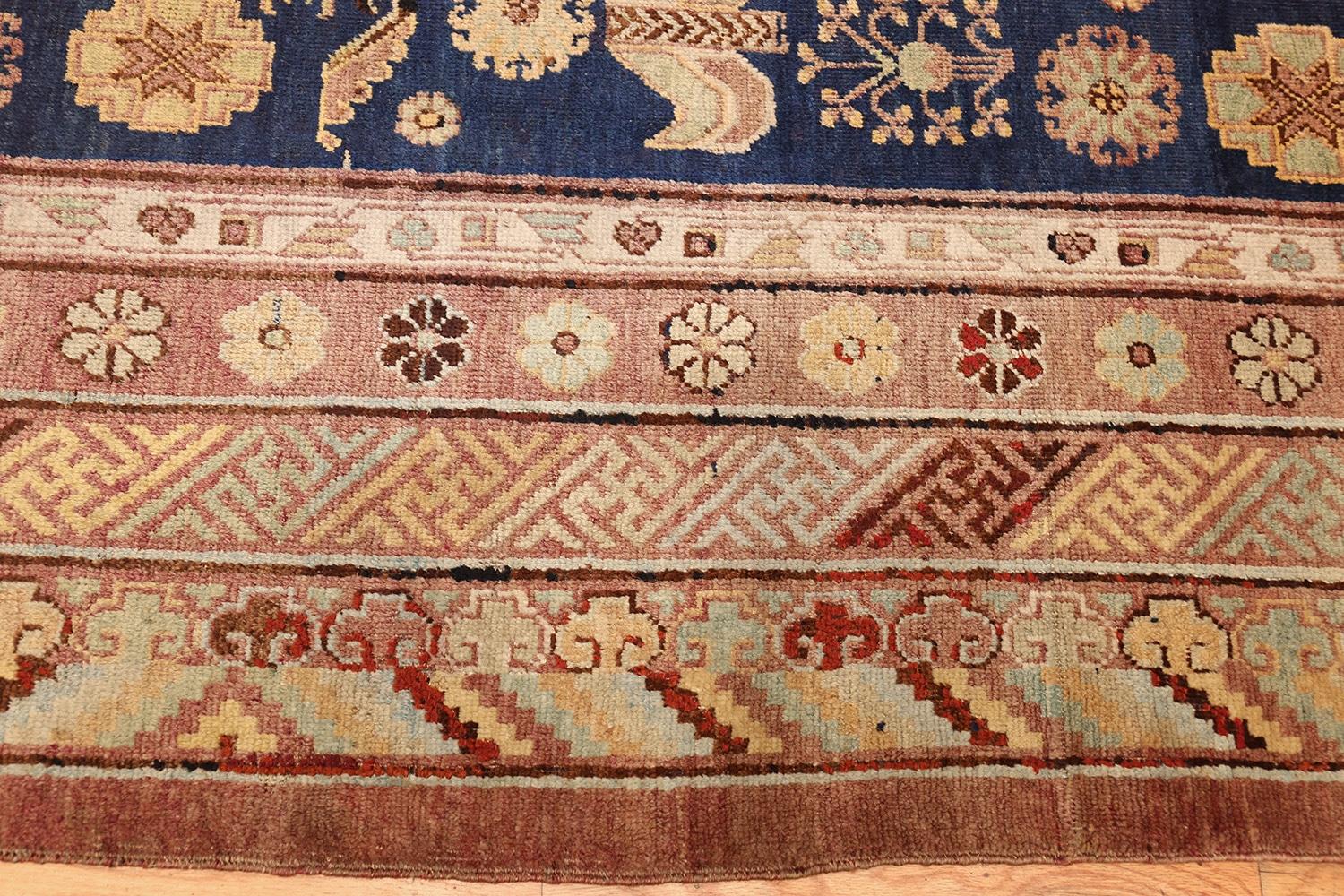 Antique Khotan rug, Country of Origin: East Turkestan, Persia, Circa date: 1920. Size: 5 ft 5 in x 11 ft (1.65 m x 3.35 m)

