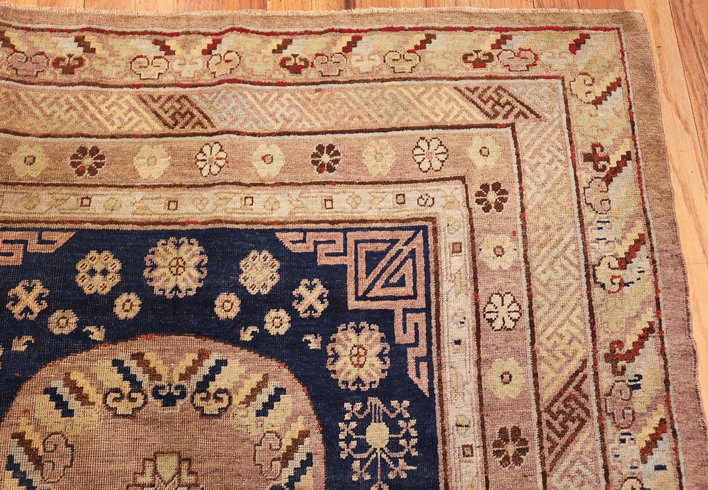 East Turkestani Antique Khotan Carpet from East Turkestan. 5 ft 5 in x 11 ft For Sale