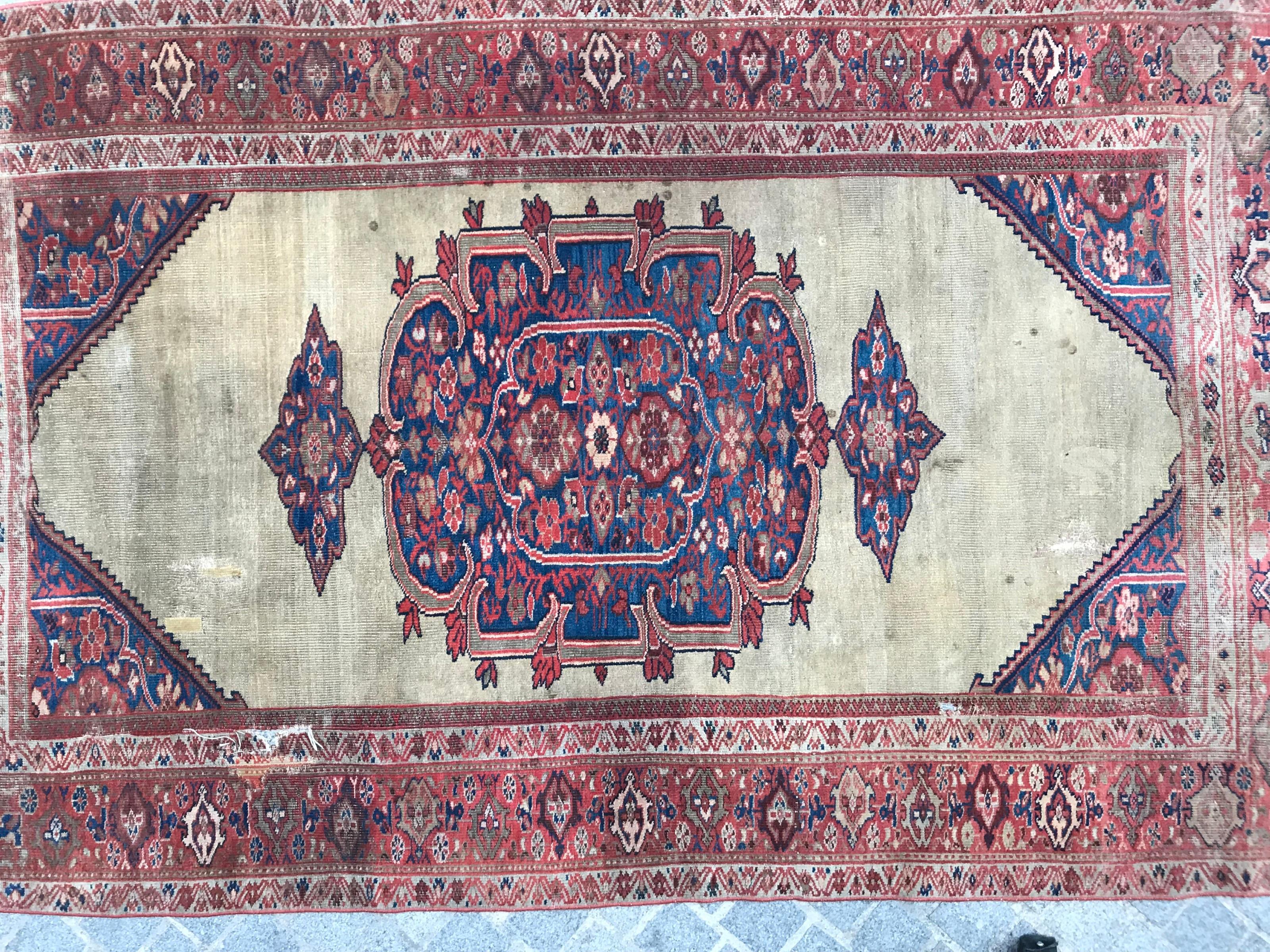 Nice 19th century large runner with a beautiful design with a nice central medallion and Herati design, and natural colors with red, blue, yellow, green and beige field, entirely hand knotted with wool velvet on cotton foundation.