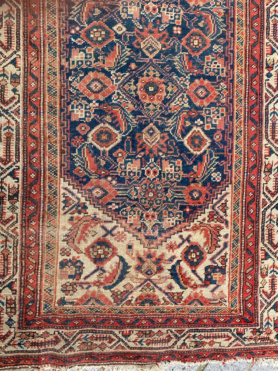 Very beautiful late 19th century tribal runner with nice decorative and floral stylized design and beautiful natural colors, entirely hand knotted with wool velvet on cotton foundation.