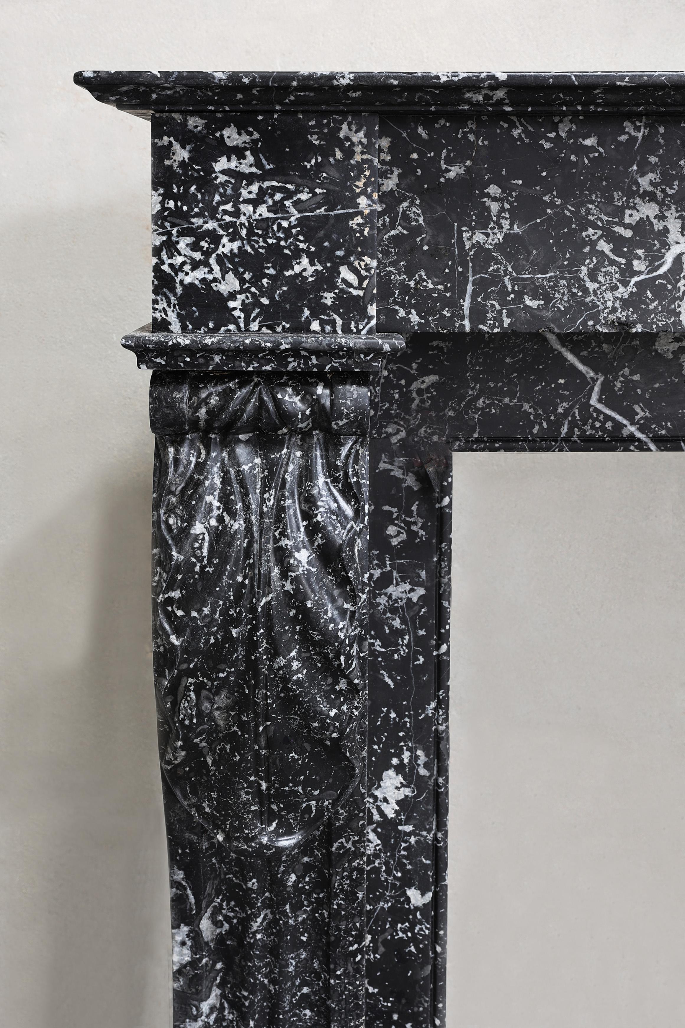 Beautiful antique mantelpiece made of black marble with white veins in the style For Sale 3
