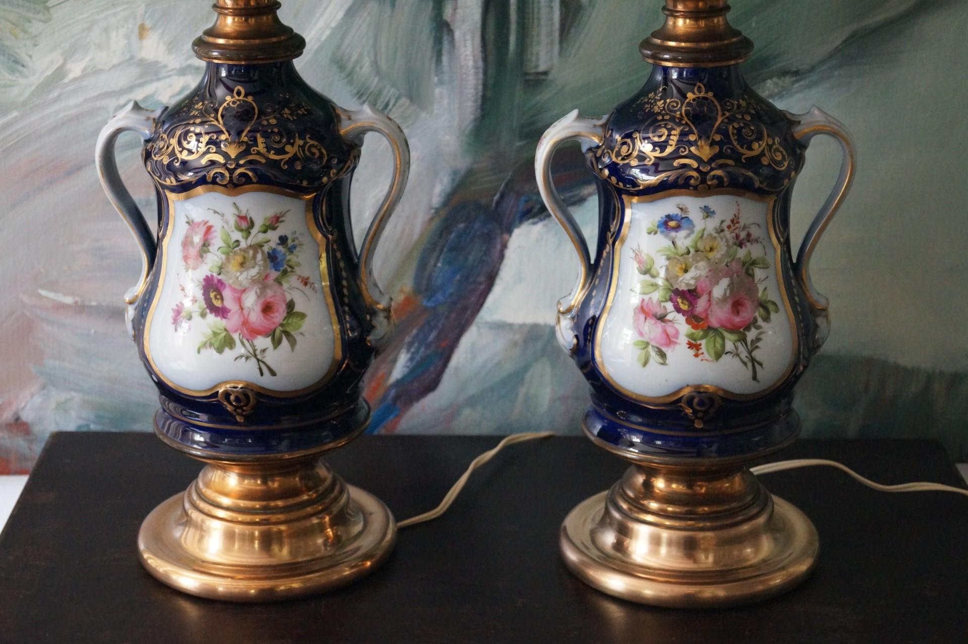 Beautiful Antique Old Paris Porcelain Oil Lamps ca 1880s

Beautiful antique Old Paris porcelain Lamps 

These lamps, originally oil lamps, were converted into electric lamps in the 1960s

The 2 glass lampshades are made of very thin glass and you