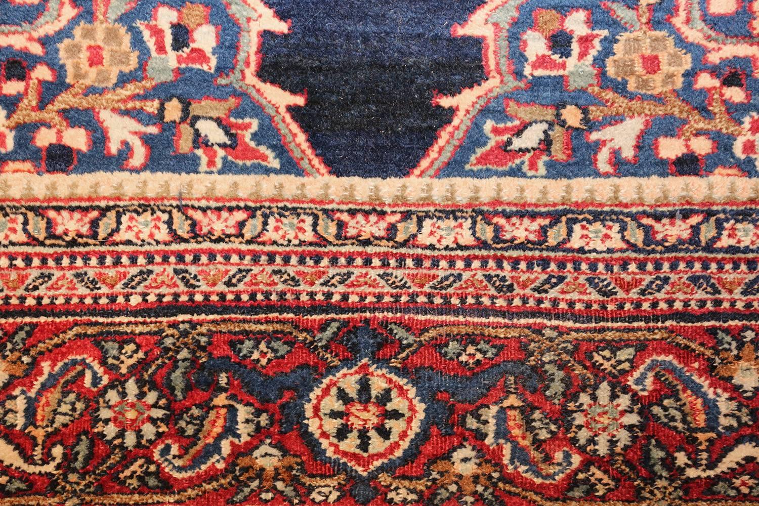 Antique Persian Khorassan rug, origin: Persia, circa first quarter of the 20th century. Size: 4 ft 5 in x 6 ft 8 in (1.35 m x 2.03 m)

Featuring an elaborate series of borders as well as bold and vibrant coloration throughout, this antique