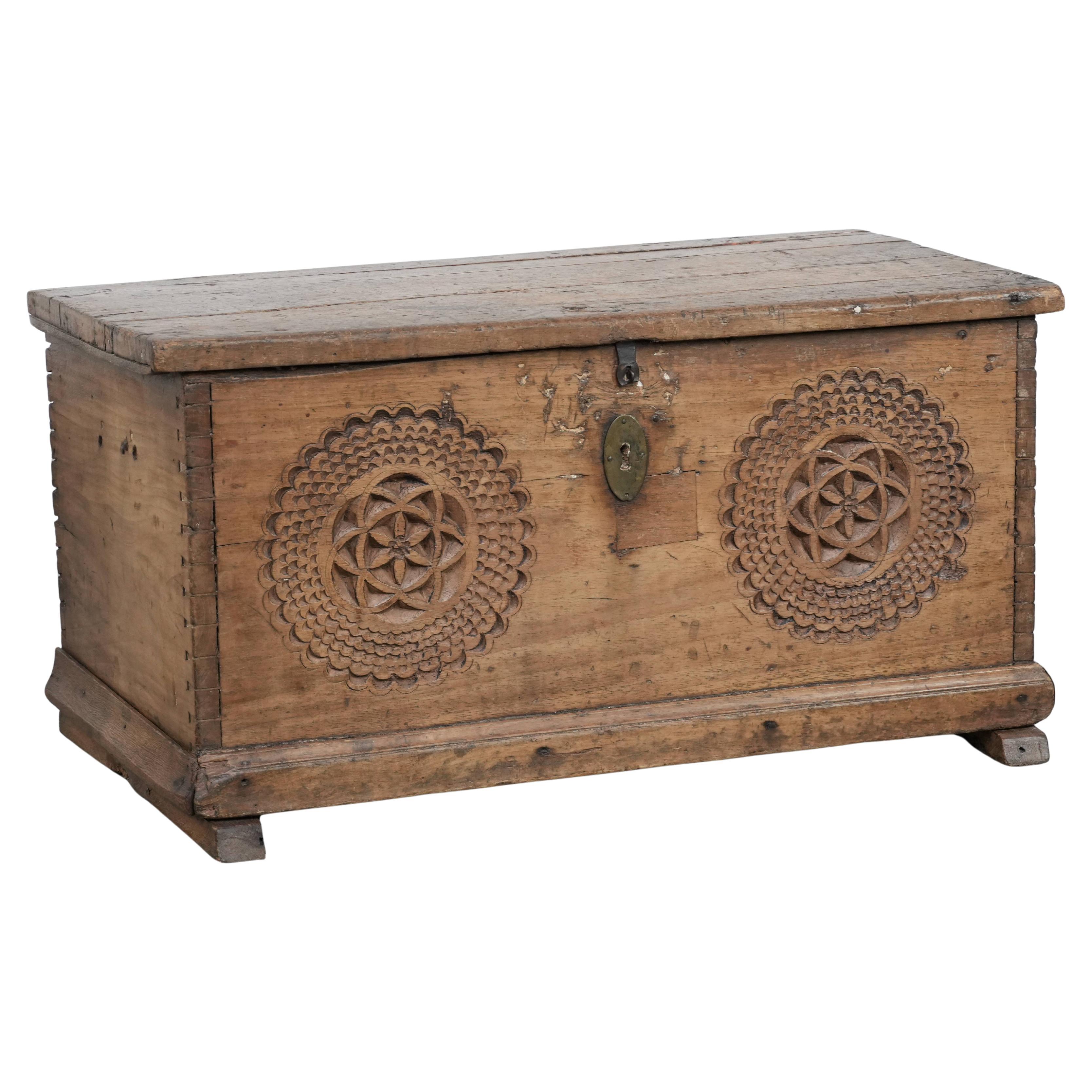 Beautiful antique Spanish chest made of walnut with beautiful wood carving