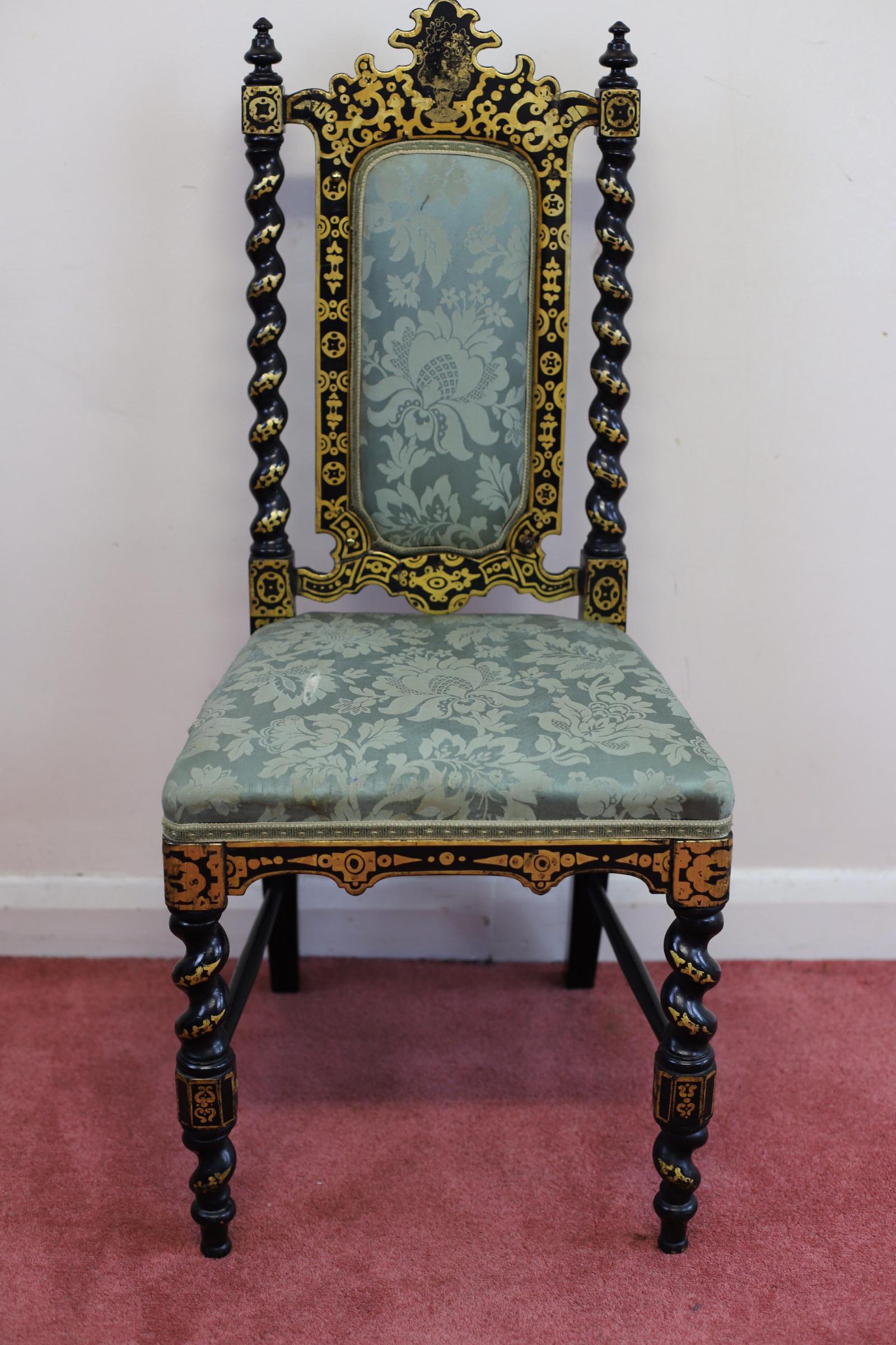 We delight to offer for sale this Stunning early Victorian ebonised and gilt painted papier mache hall chair with upholstered seat and back raised on spiral turned supports . Circa 1830-1850 
Don't hesitate to contact me if you have any