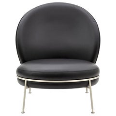 Magnifique fauteuil en cuir noir avec fermeture éclair visible, collection Amaretto Champagne
