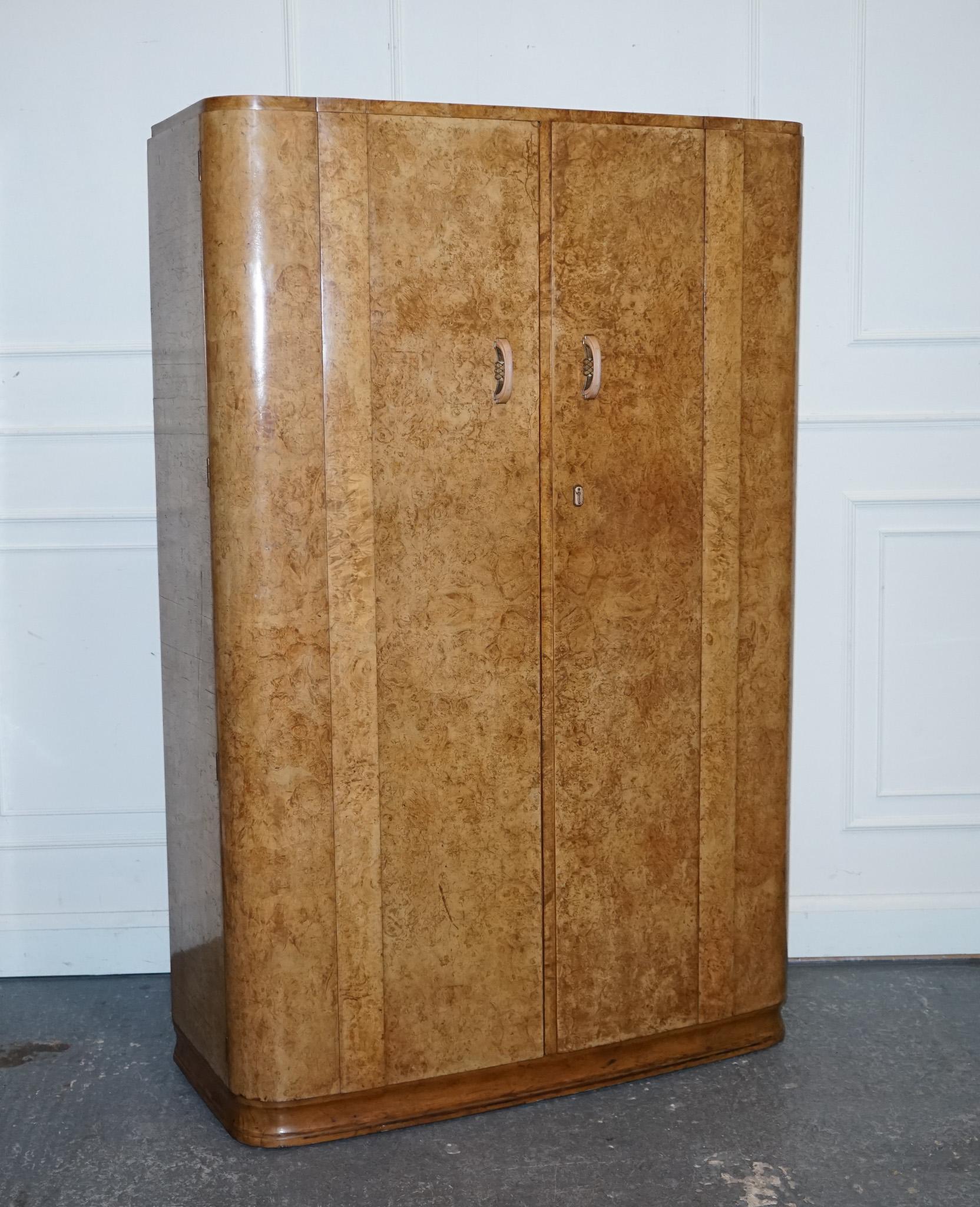 
Antiques of London



We are delighted to offer for sale this Beautiful Art Deco Blonde Walnut Two Door Wardrobe. 

A very good quality piece of furniture, designed in blonde walnut and curved doors. It has a rail all the way to maximise storage