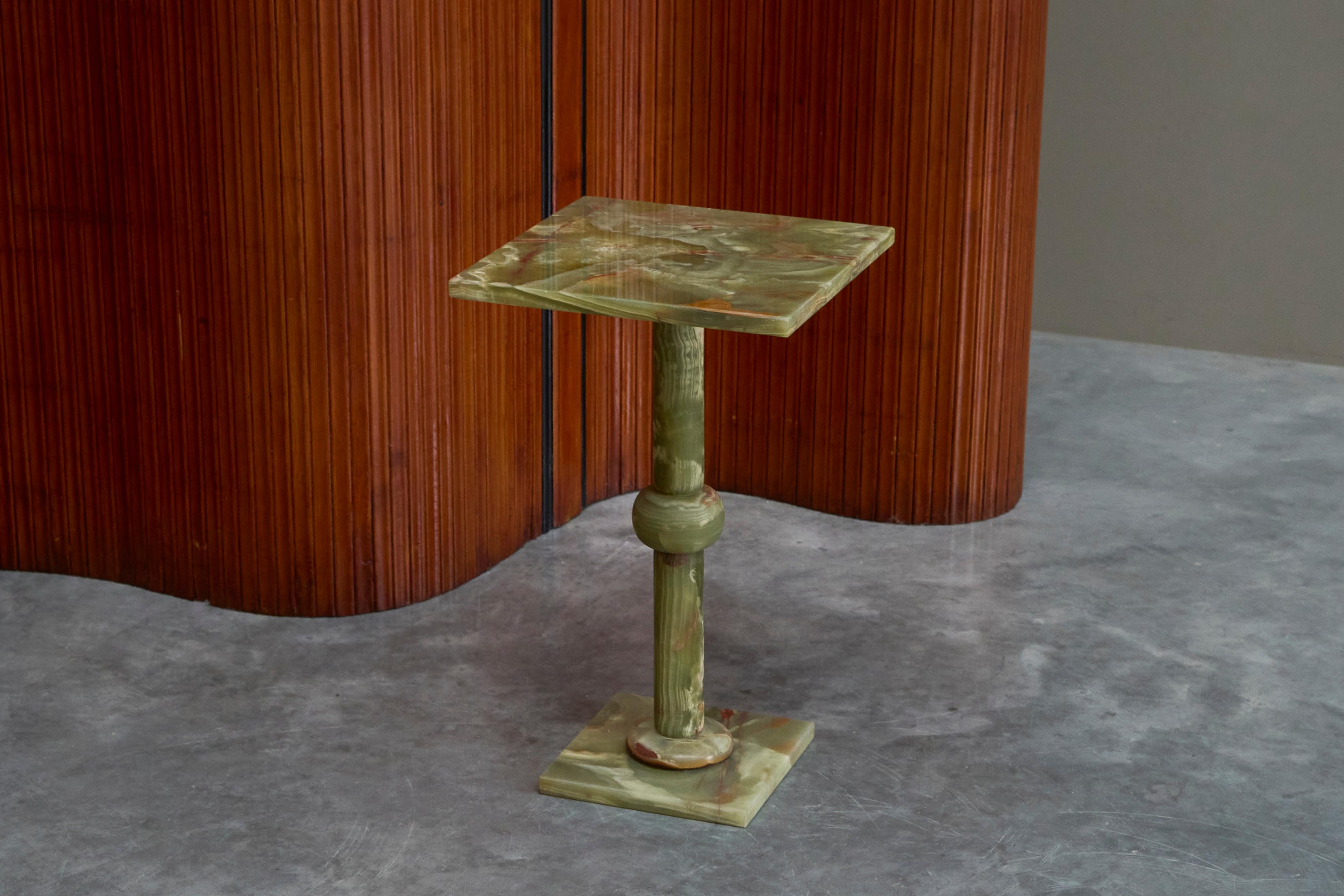 Beautiful Art Deco Side or Gueridon Table in Green Alabaster 1940s

A very beautiful side table in stunning green alabaster. Probably Italian, 1940s.

The side table features a simple yet elegant design of art deco nature with a square top and
