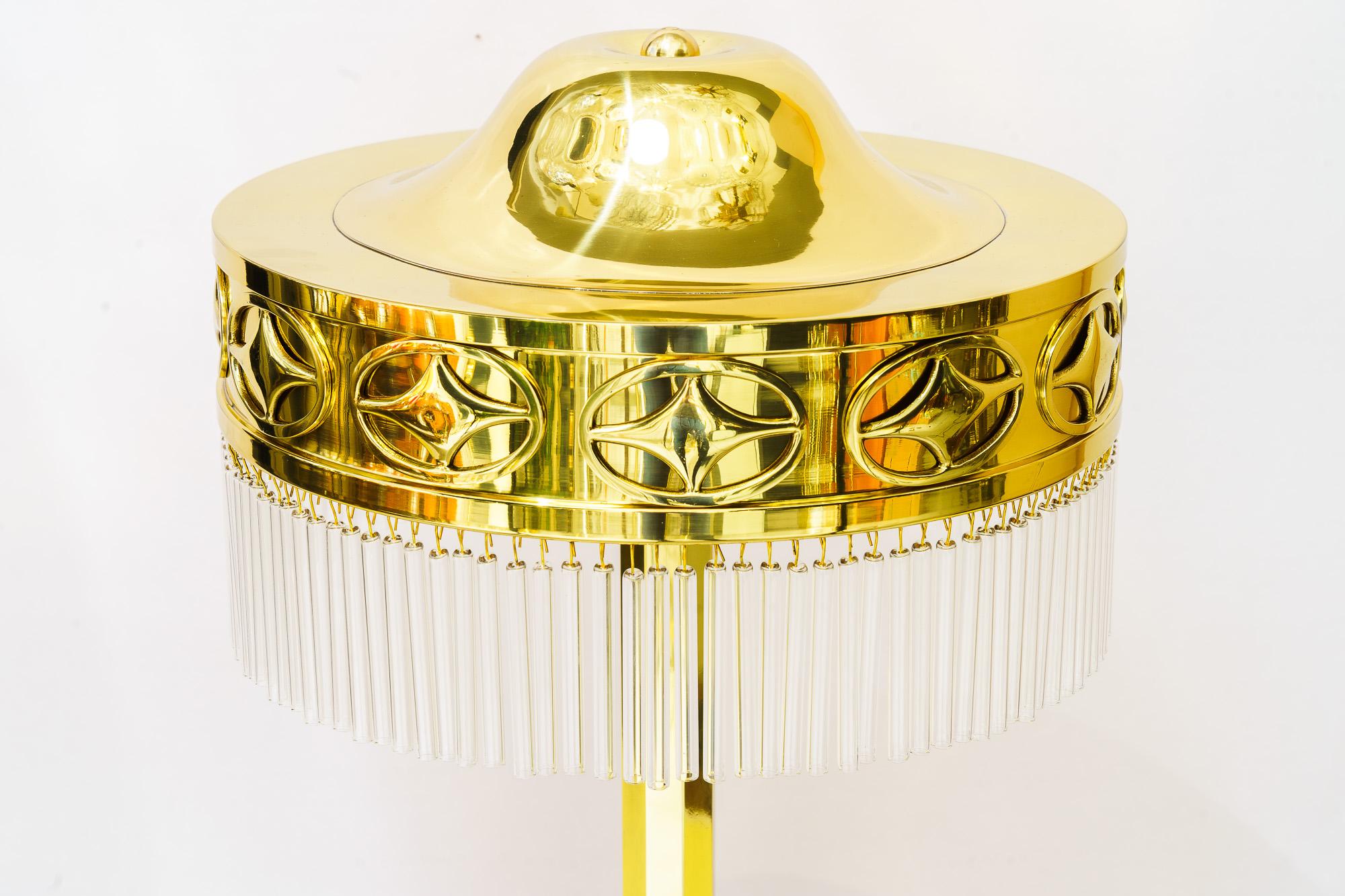 Beautiful art deco table lamp vienna around 1920s
Brass polished and stove enameled
The glass sticks are replaced ( new )
Very quality excecution