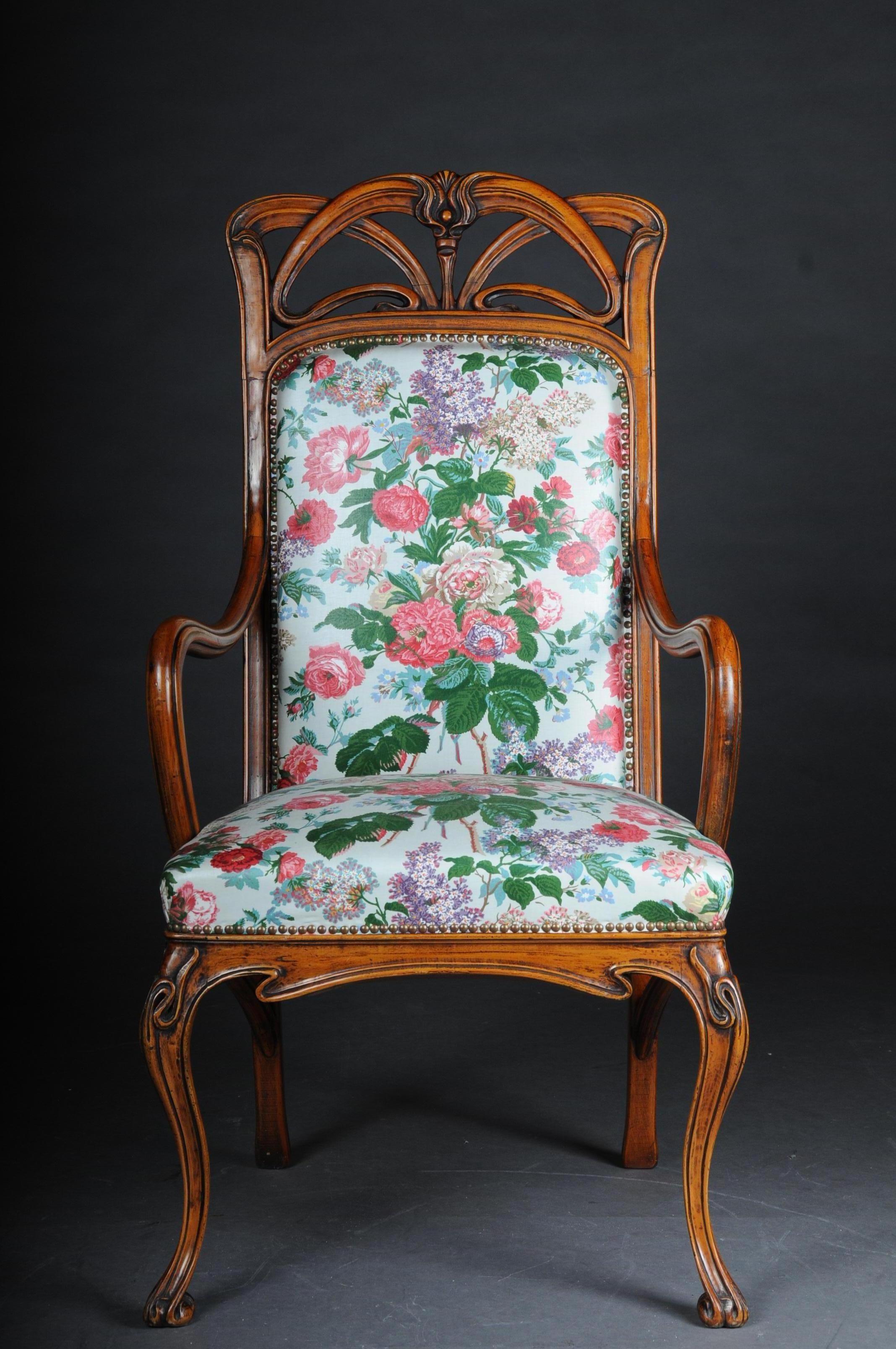 Solid wood floral carved. Rich carving. Armchair with long, curved legs. Model after Louis Majorelle. Seat and back with Classic upholstery. 


(B-159).