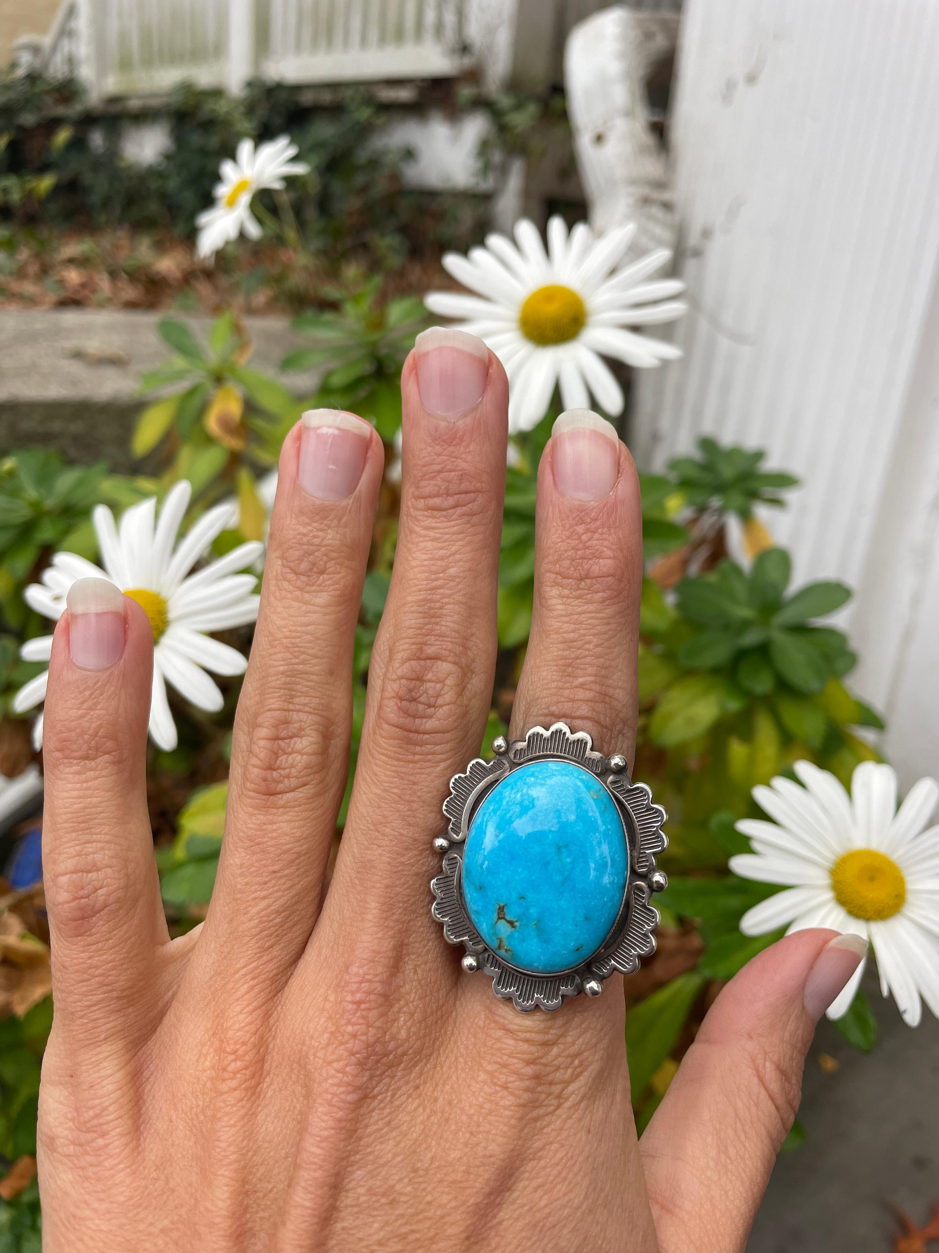 Beautiful Artisan Made Blue Turquoise Sterling Silver Native American Ring

A beautiful bright blue artisan made turquiose sterling silver ring. 

Stamped 
