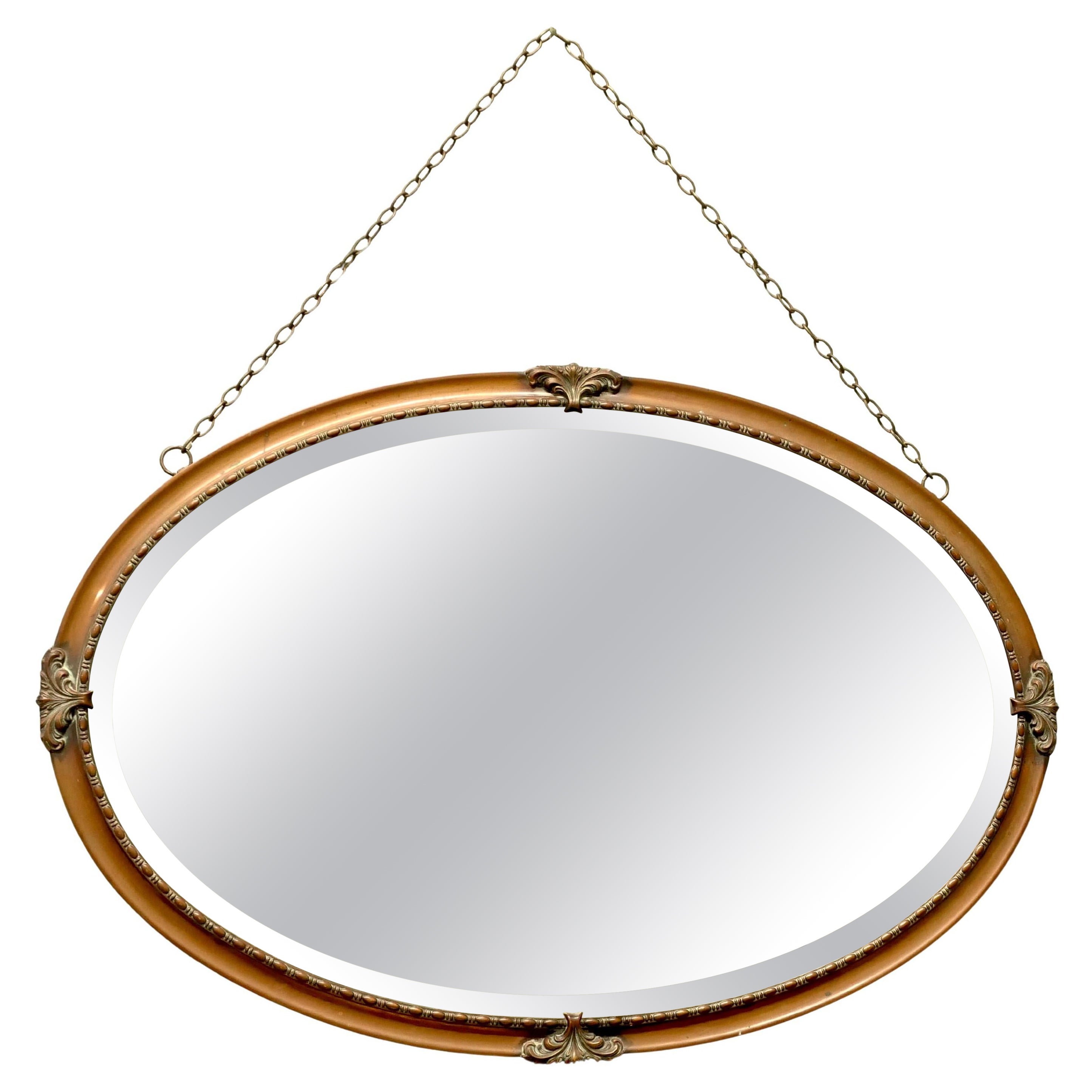 Bellissimo specchio da parete ovale in rame di Arts and Crafts in vendita