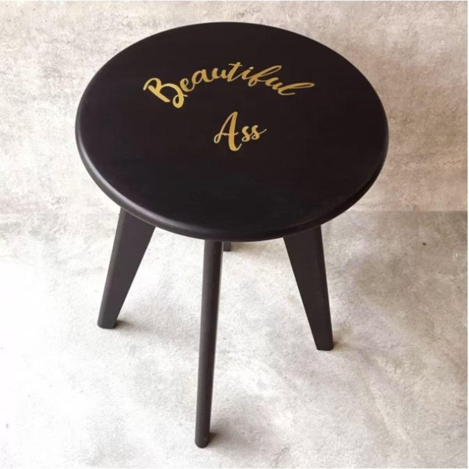 Beautiful Ass Black Stained Ash ASSY Stool by Mademoiselle Jo
Dimensions: Ø 35 x H 43 cm.
Materials: Ash wood and brass inlay.

Available in two wood colors and several designs.  Please contact us.

At the border between design and goldsmithing, the