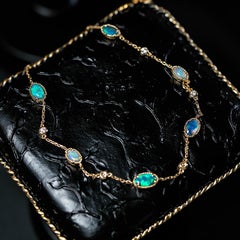 Beautiful Australian Black Opal Diamond Bracelet in 18K Yellow Gold