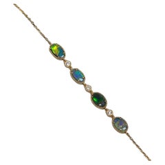 Beautiful Australian Black Opal Diamond Bracelet in 18K Yellow Gold