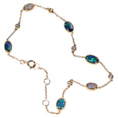 Beautiful Australian Black Opal Diamond Bracelet in 18K Yellow Gold
