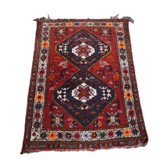 Beautiful authentic and colorful oriental rug with 2 diamond patterns 130x90cm