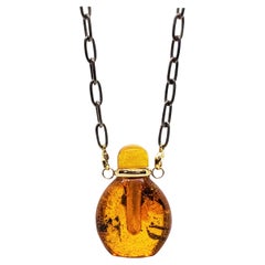 Magnifique petite bouteille de parfum baltique en ambre avec collier à bouchon en or 14 carats