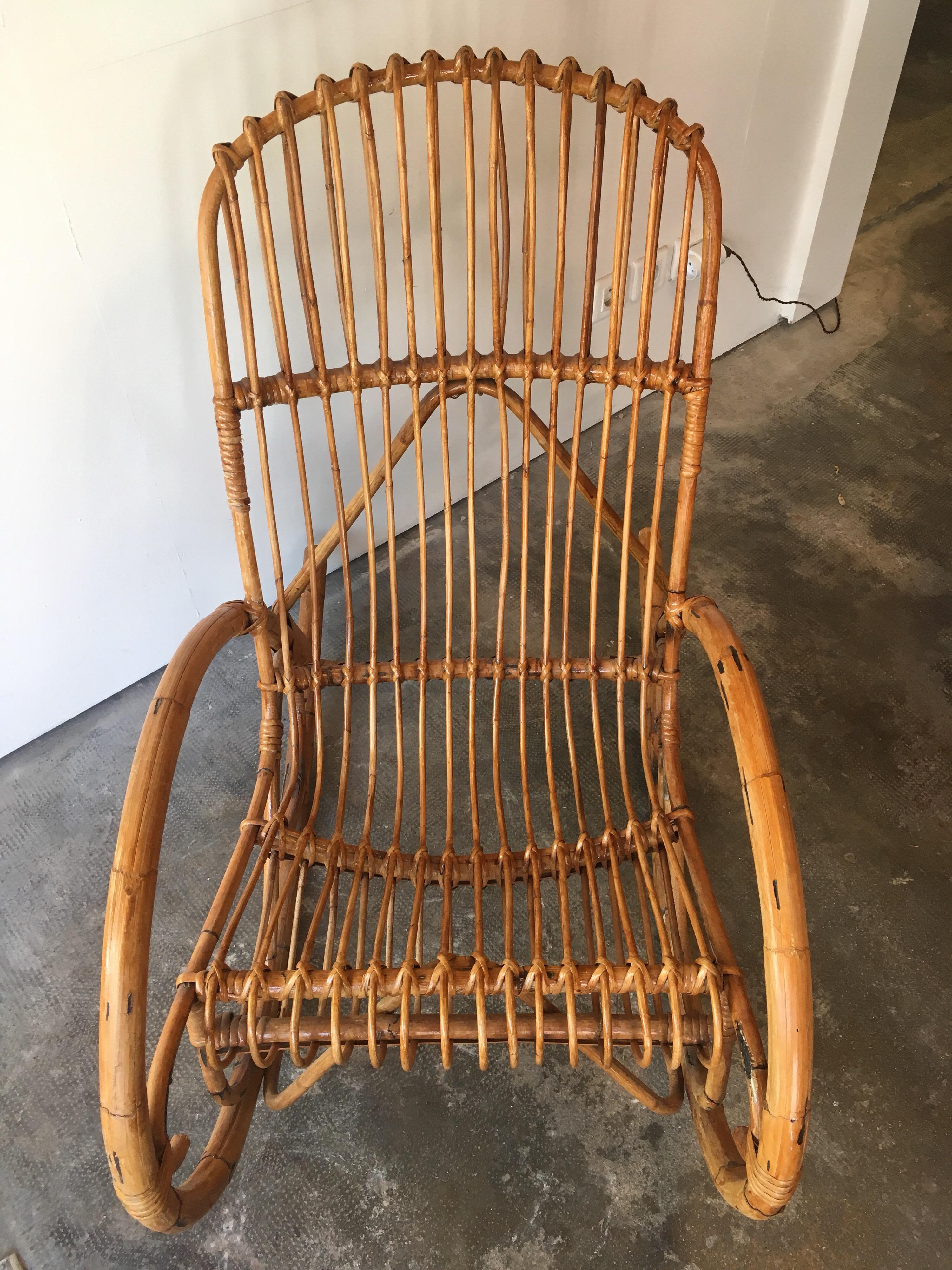 Beautiful bamboo and rattan rocking chair, circa 1970.
In very good condition.
Really nice European work.
A perfect piece of furniture that could suits perfectly in our garden!