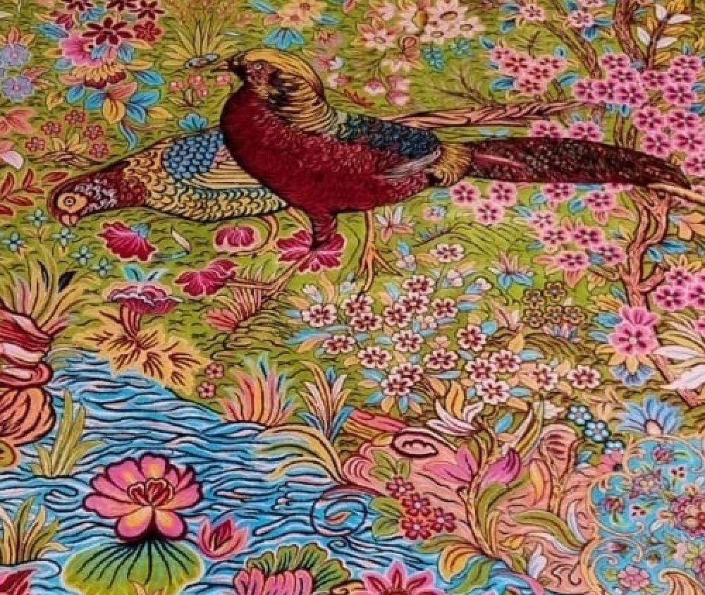 If a Picture paints a thousand words, then this is probably a typical example. Here is an amazing Picture Rug. It can be hung as a tapestry or used on the floor. The scene depicts beautiful birds, some in flight and another taking a drink from the