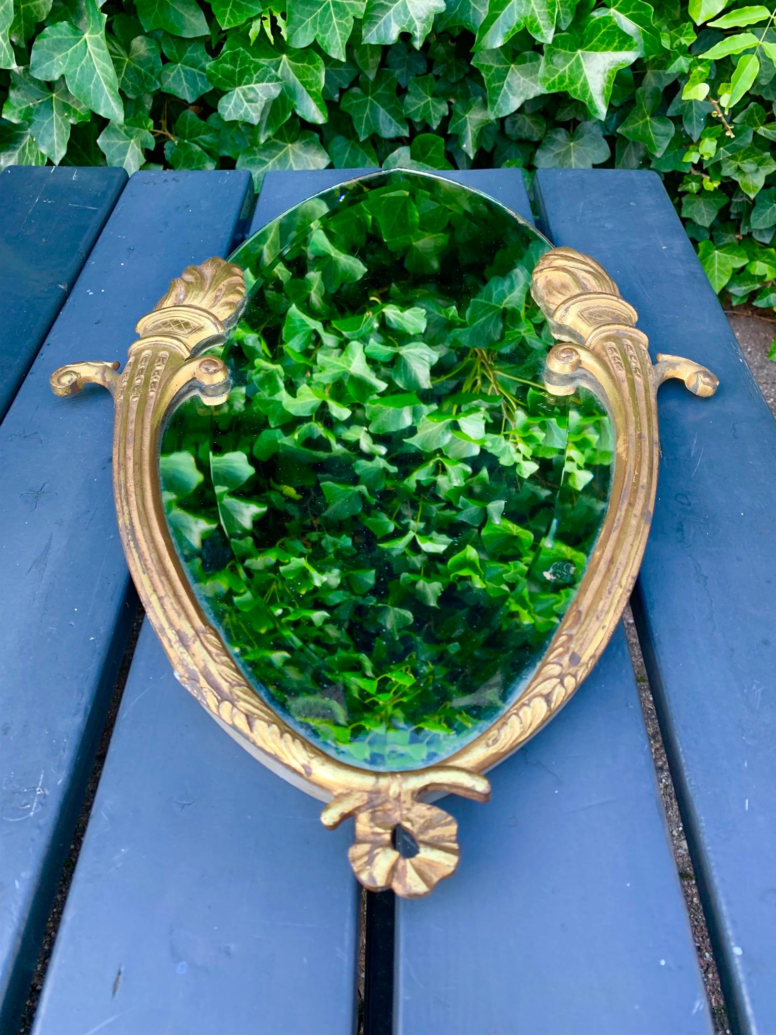 French Beautiful & Beveled Wall Mirror in Gilt Bronze Frame w. Eternal Flame Torchères For Sale