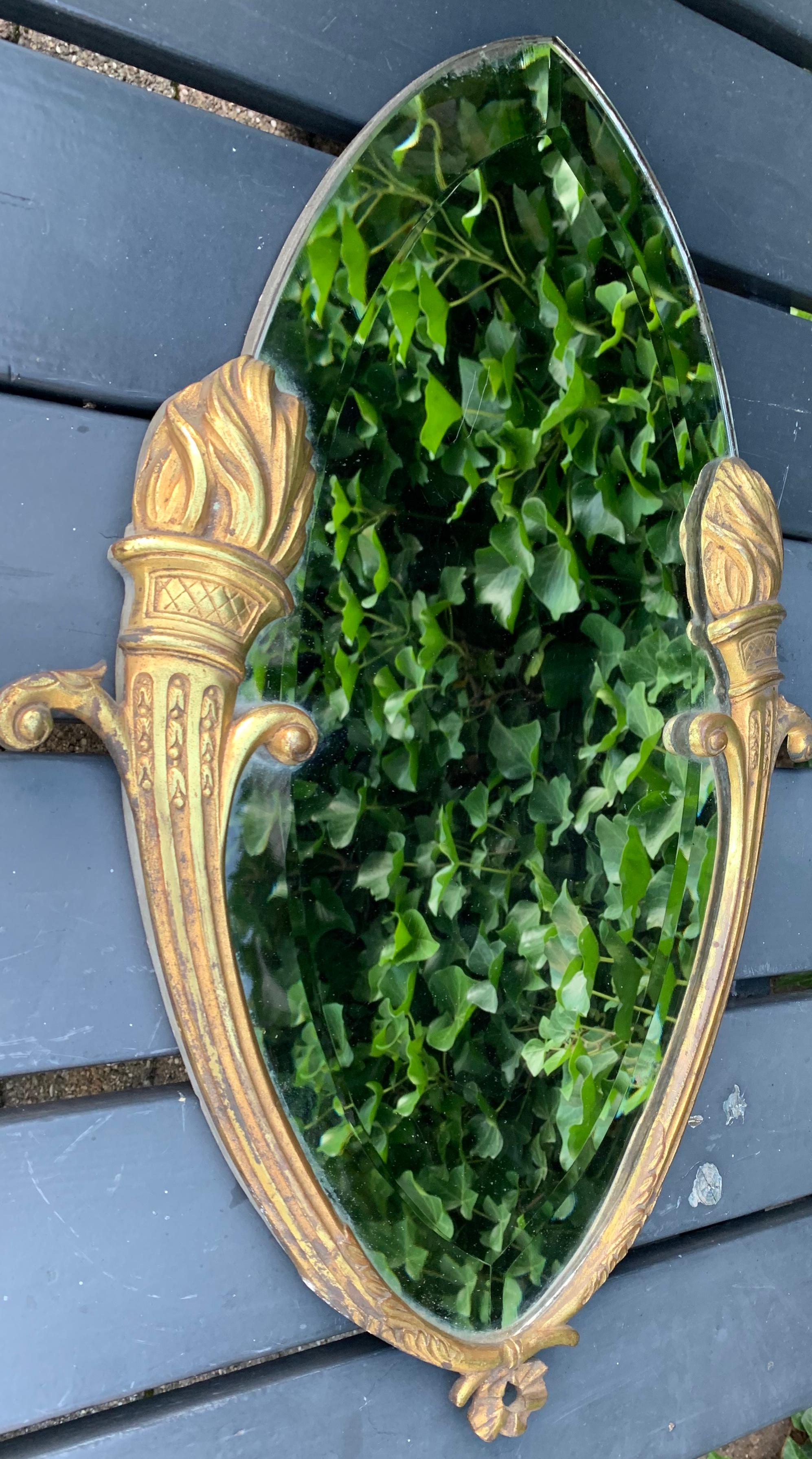 French Beautiful & Beveled Wall Mirror in Gilt Bronze Frame w. Eternal Flame Torchères For Sale