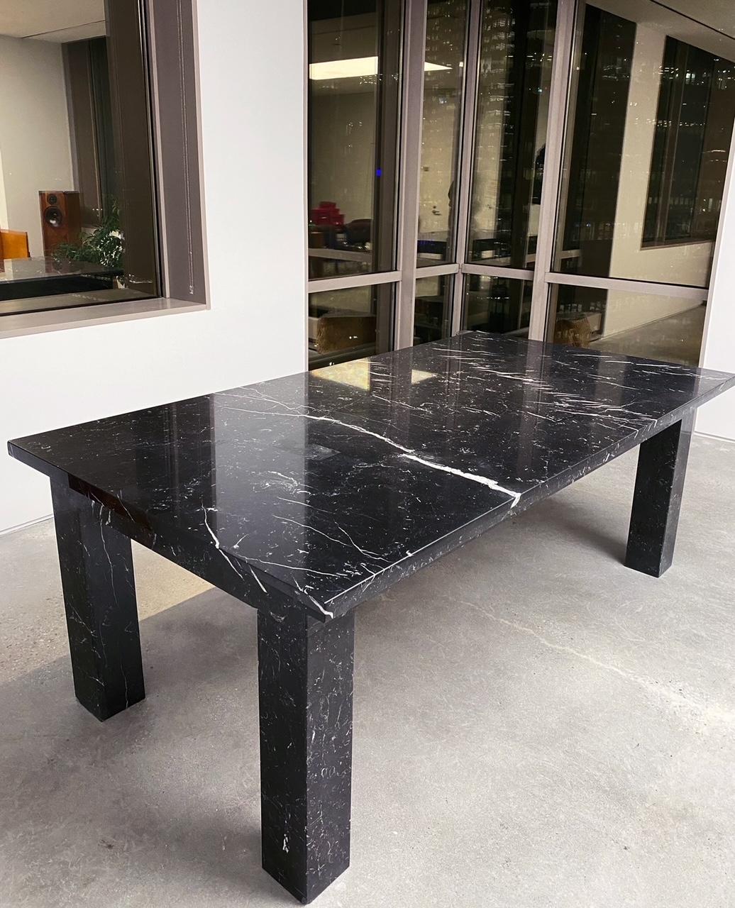 Beautiful black and white custom marble conference dining table, 2000s

Thick and beautiful. Was custom made for a high end fashion showroom. Black with marble veining throughout. Thick solid and heavy.