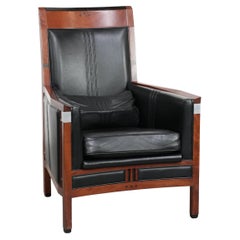 Beautiful black cow leather Art Deco armchair with high back