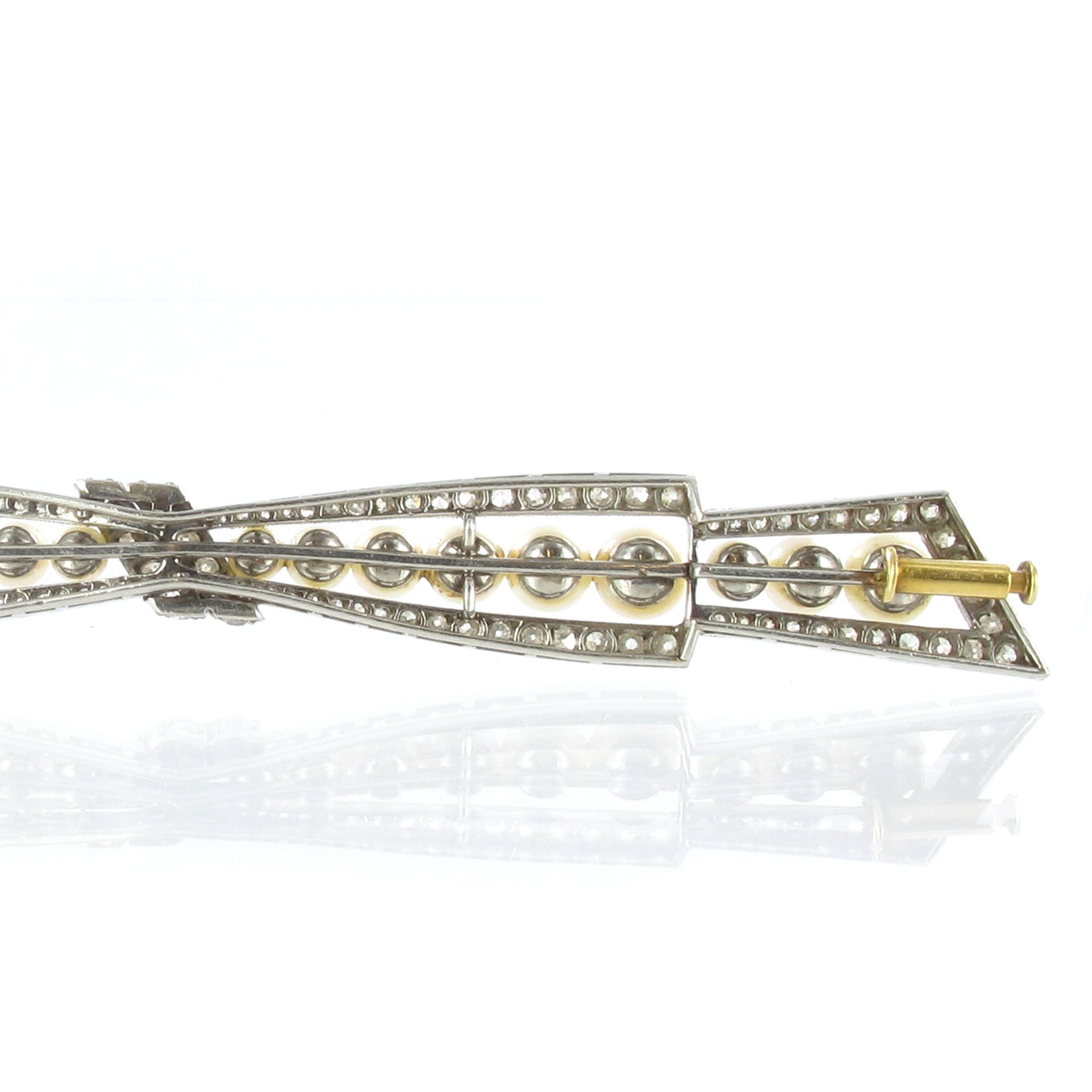 Edwardian Beautiful Bow Brooch with Natural Pearls and Diamonds in Platinum and Gold