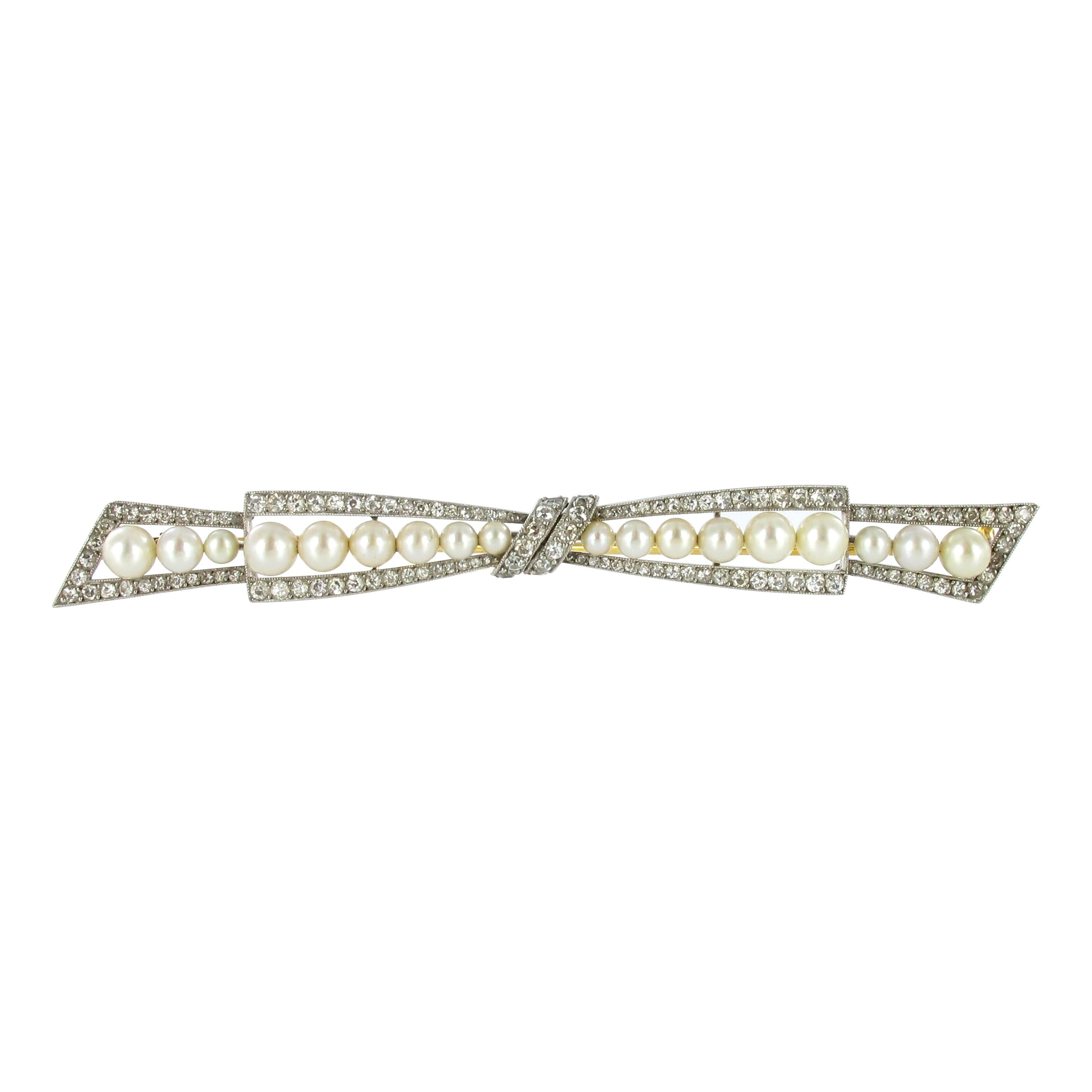 Beautiful Bow Brooch with Natural Pearls and Diamonds in Platinum and Gold