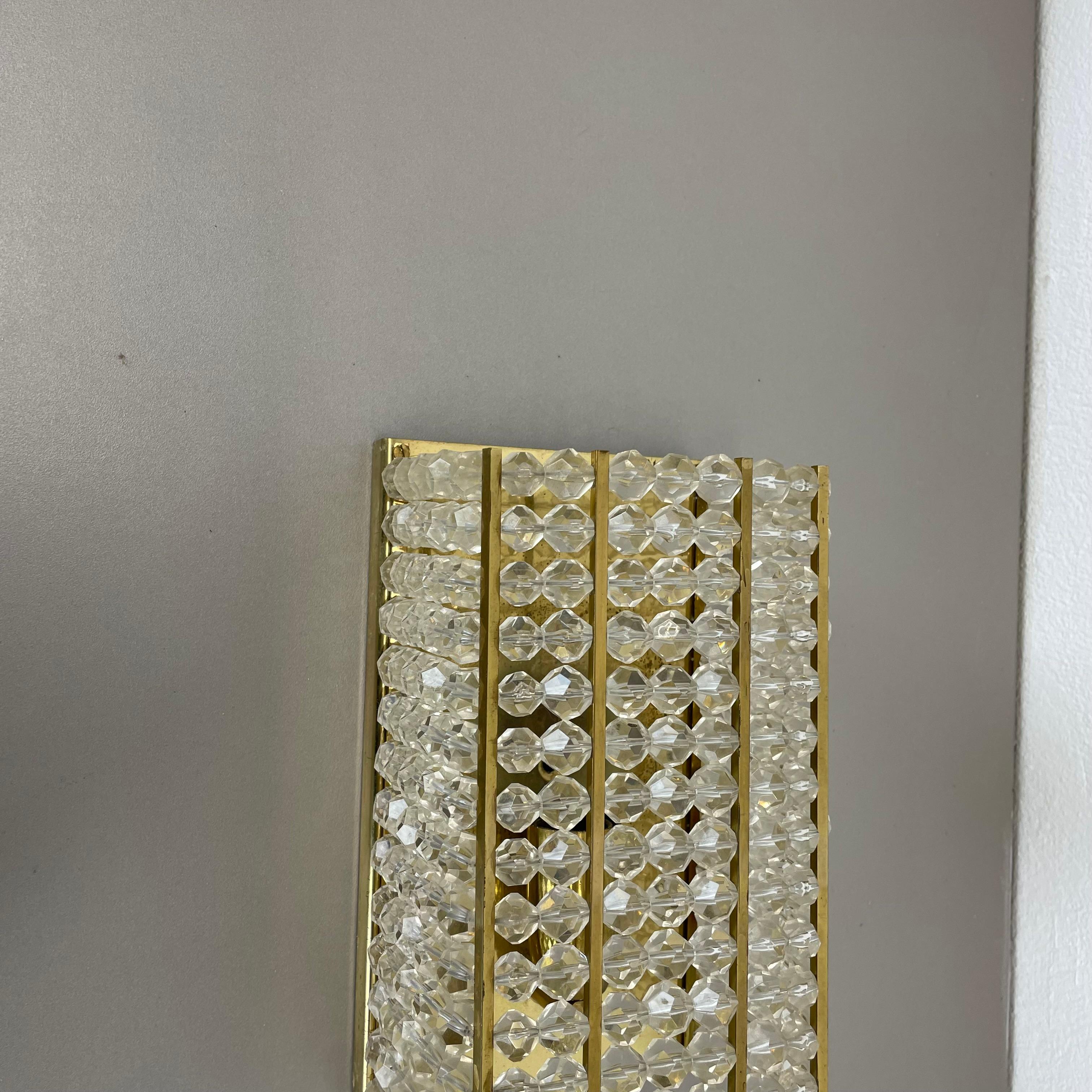 Article:

Wall light sconce


Design::

Emil Stejnar, Austria



Origin:

Austria



Age:

1950s



This super rare wall light was designed in the 1950s by Emil Stejnar in Austria. the light light is made of a brass wall fixation and at the front a