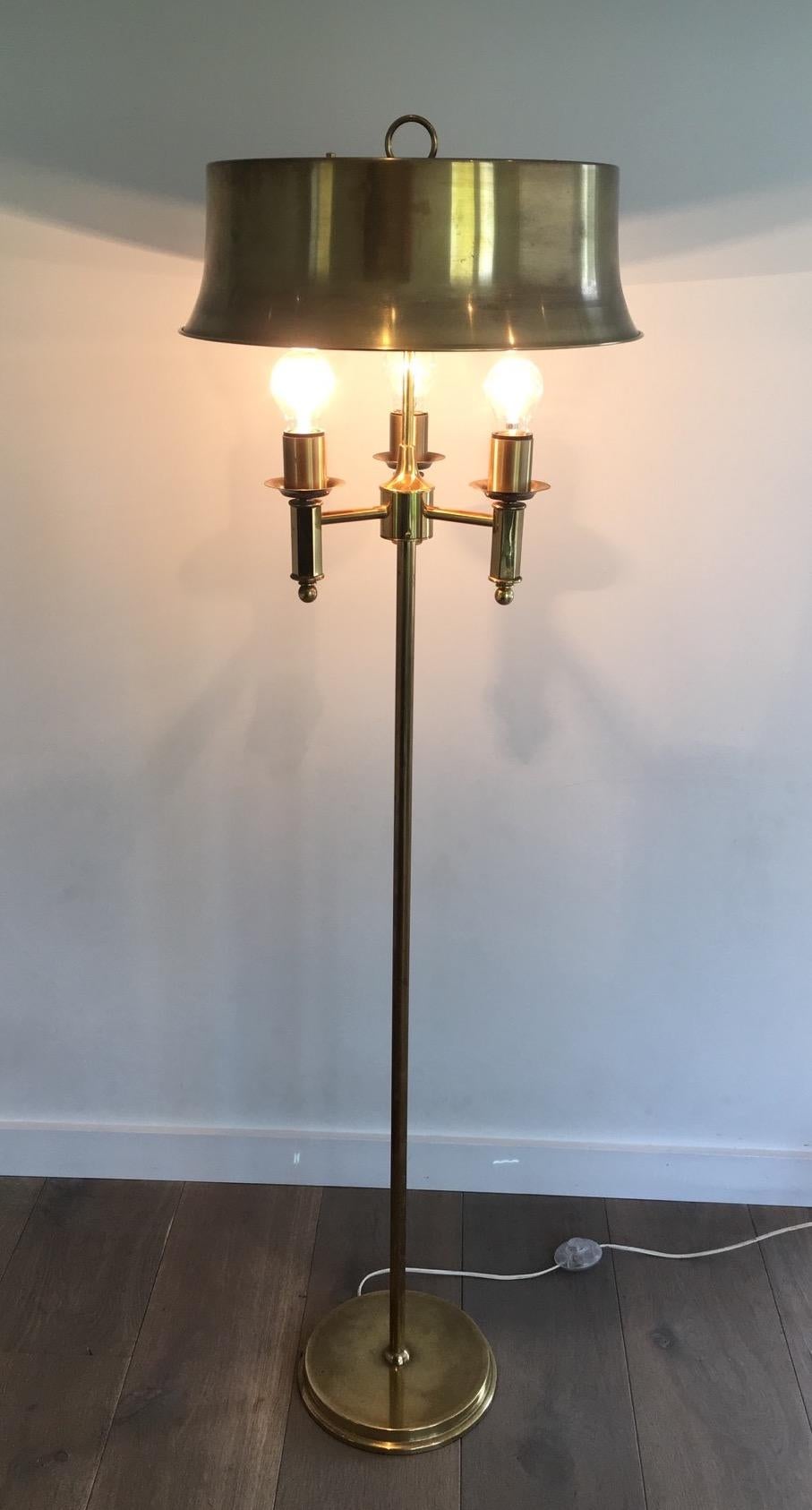 This floor lamp is all made of bronze and brass, including its shade which is made of brass. There is a circle space on the top of the shade which shows a light's circle when the light is on. The quality of this lamp is very good. This is a French