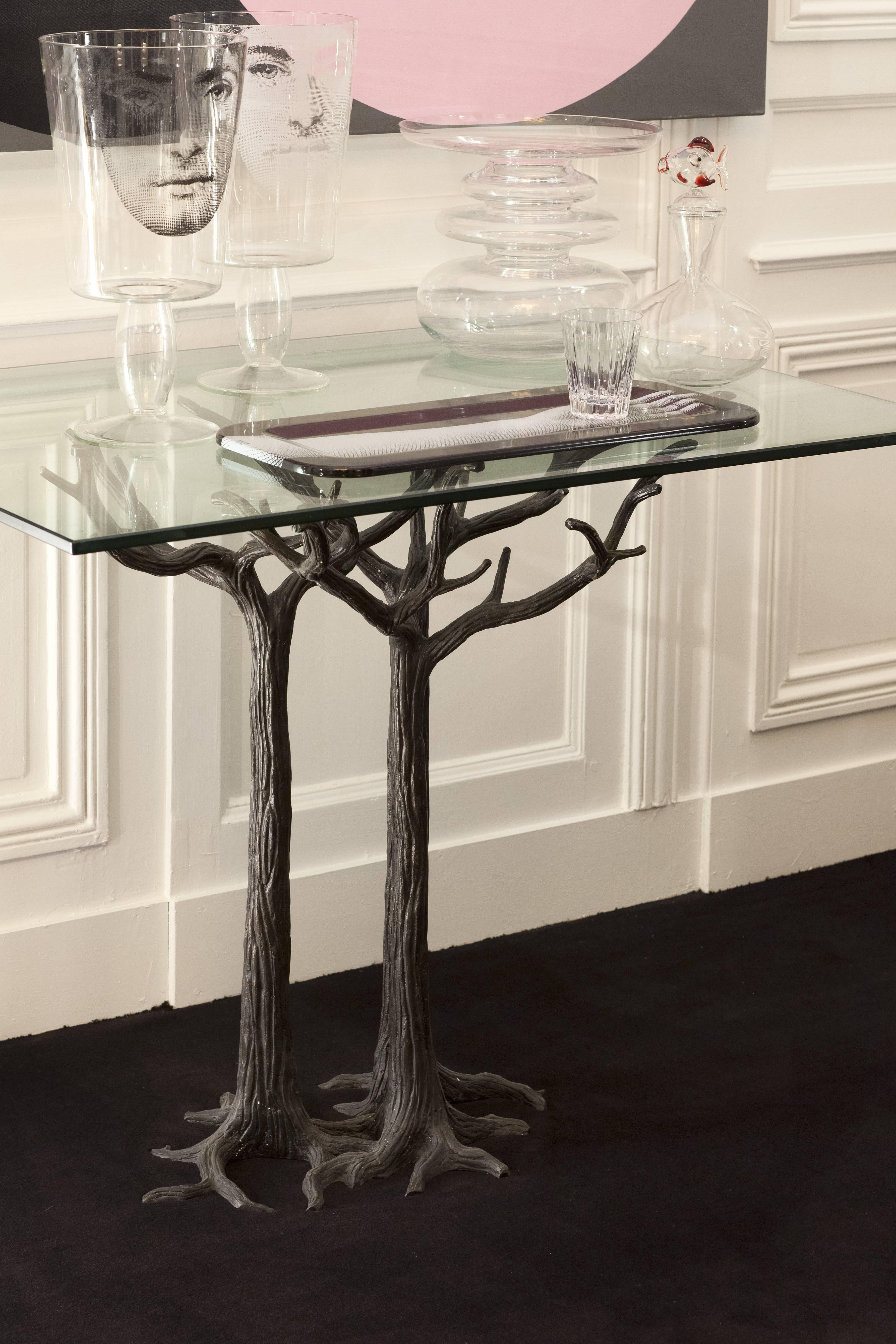 Beautiful bronze and glass console representing tree trunks. 
This model is a prototype by Jean Boggio, French famous designer made before the limited edition.

Jean Boggio is a craftsman, Goldsmith jeweller, and contemporary French artist.

Jean