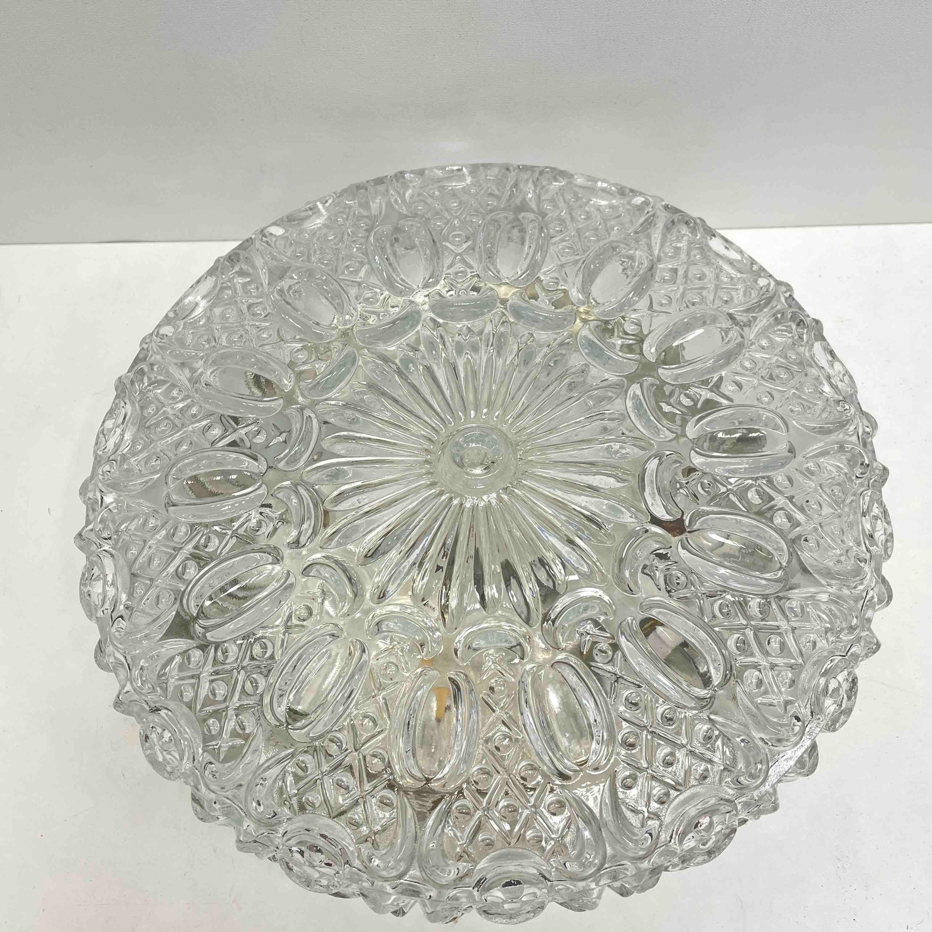 Beautiful bubble glass pattern flush mount. Made in Germany by Glashütte Limburg. Gorgeous textured glass flush mount with metal fixture. The fixture requires one European E27 Edison or Medium bulb up to 100 watts.