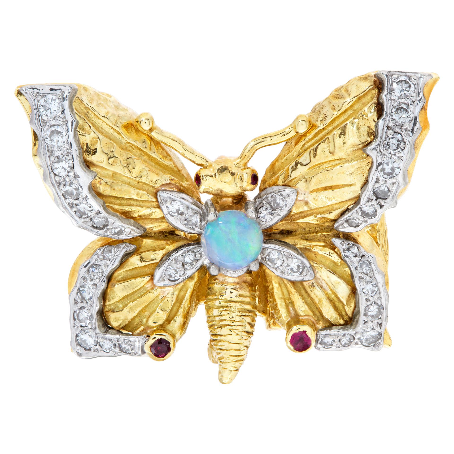 Beautiful butterfly with diamond accents, rubies and center opal in 18k yellow gold. Size 6.5.<br /><br />This Diamond ring is currently size 6.5 and some items can be sized up or down, please ask! It weighs 10.2 pennyweights and is 18k.