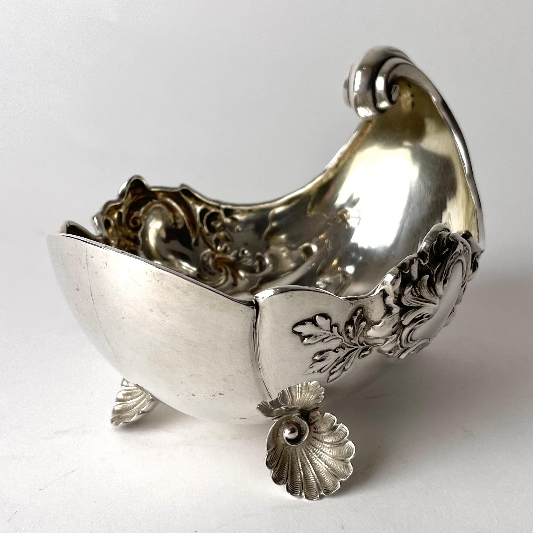 Beautiful Candy Bowl in Silver in the shape of a seashell from Mid 19th Century. The bowl is designed as a seashell with three feet also designed as seashells.


Wear consistent with age and use 
