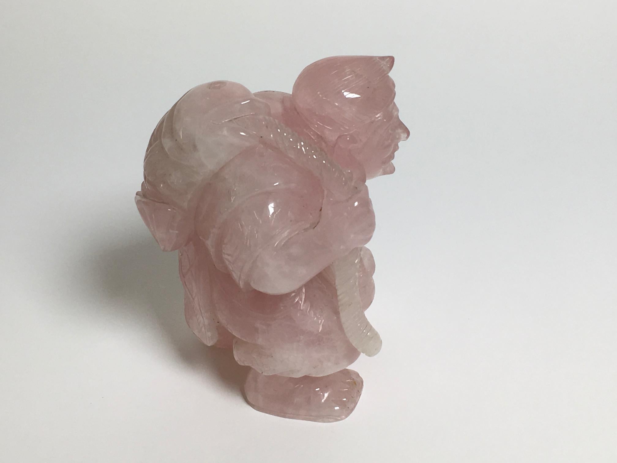 Beautiful carved rose quartz sculpture produced in China. Italian private collection.