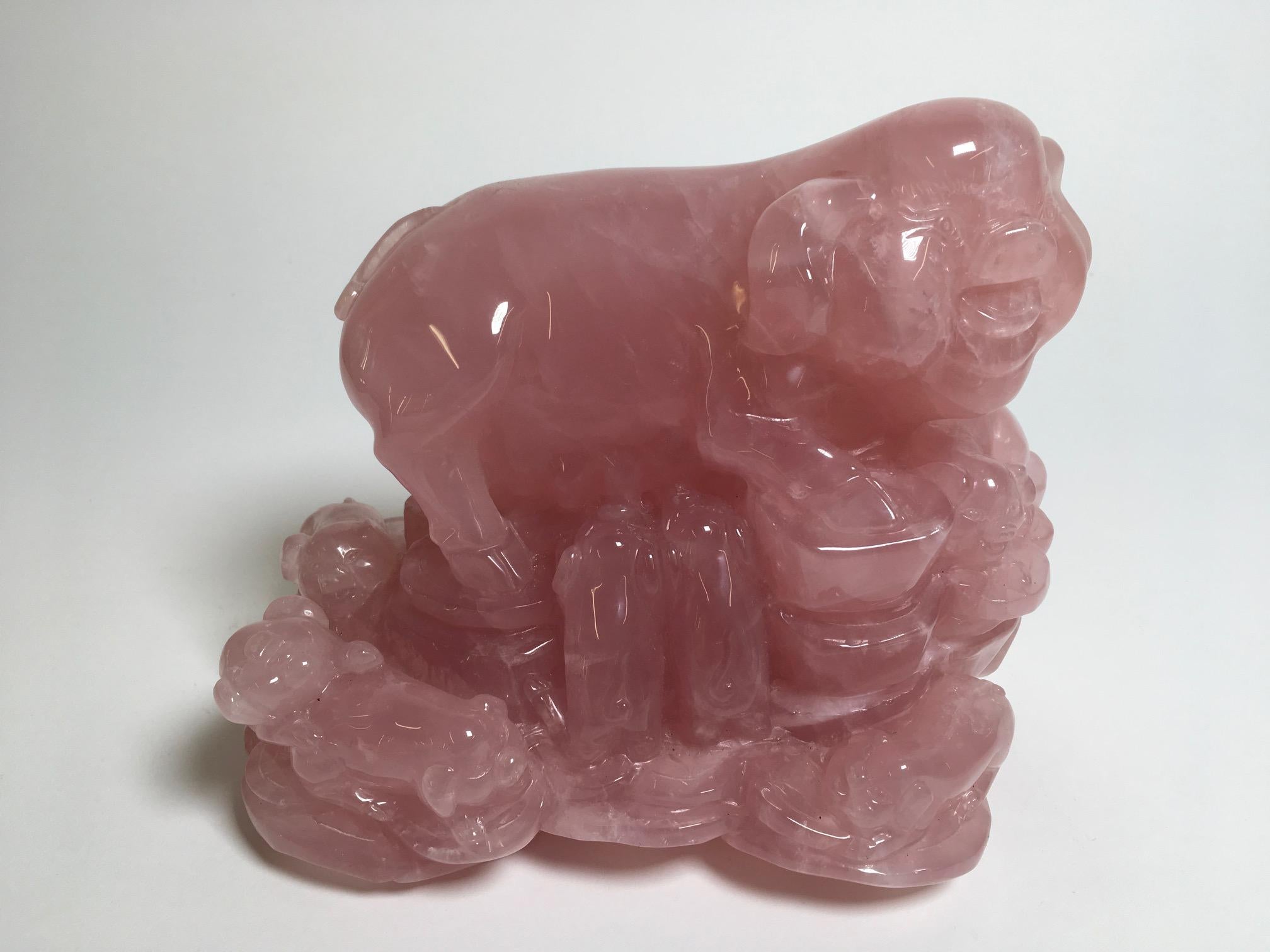 Beautiful carved rose quartz sculpture with wooden base produced in China. Italian private collection.