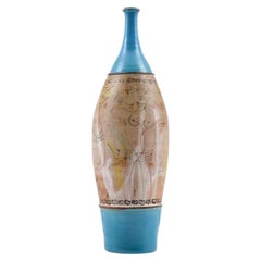beautiful ceramic bottle with abstract figurative decor by Gilbert Portanier