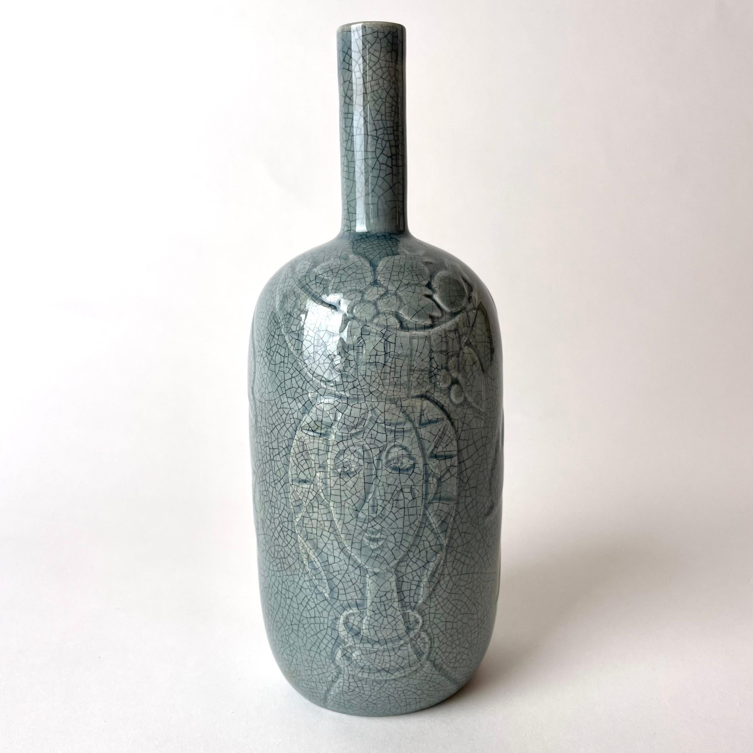 Beautiful ceramic Vase by Carl-Harry Stålhane (1920-1990), Rörstrands Porslinsfabrik, Sweden from the Mid-20th Century. Decorated with two different women carrying bowls of fruit on their heads, signed CHS and Rörstarand. Beautiful color with a